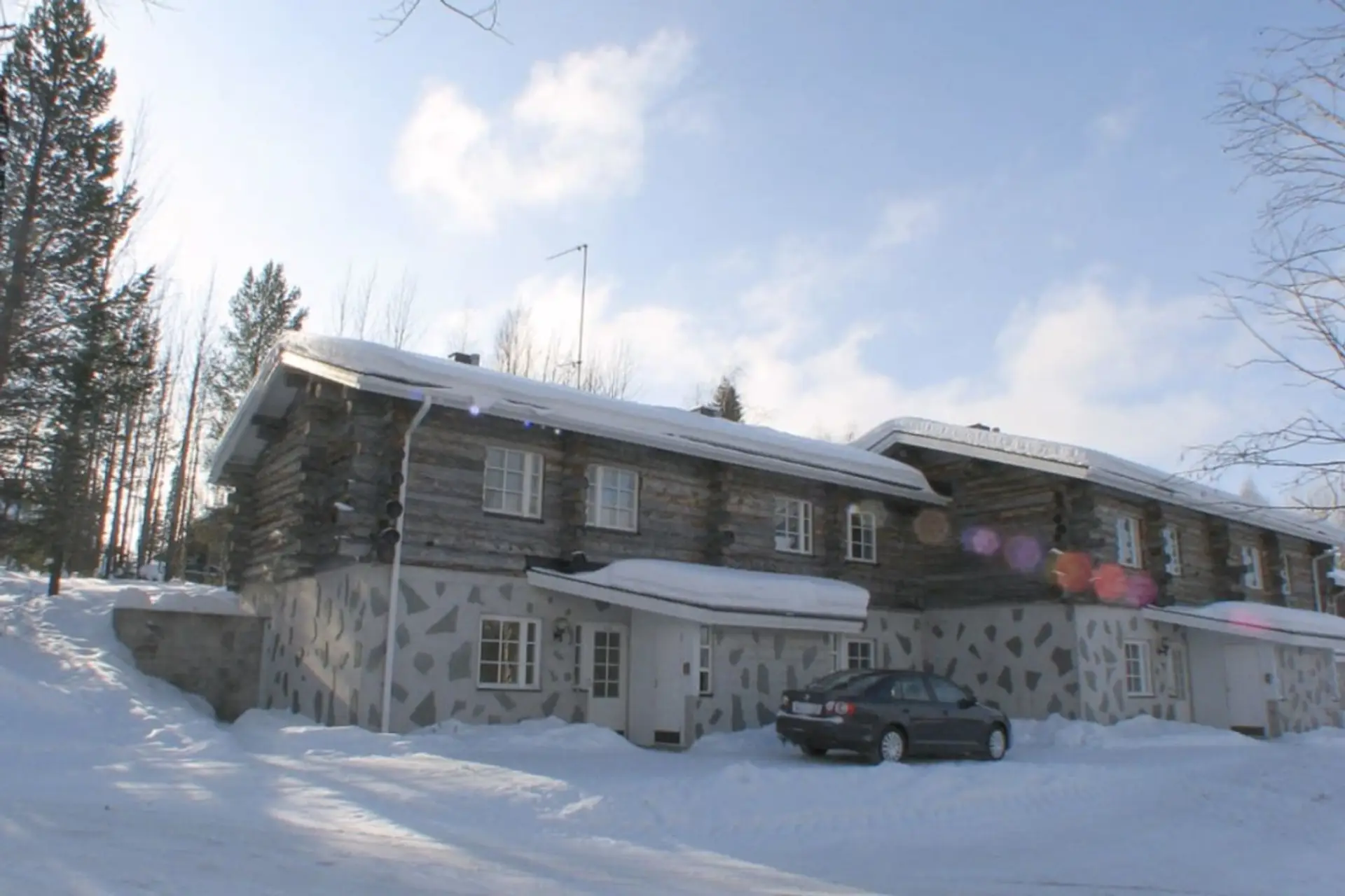 Exterior view in winter with parking area