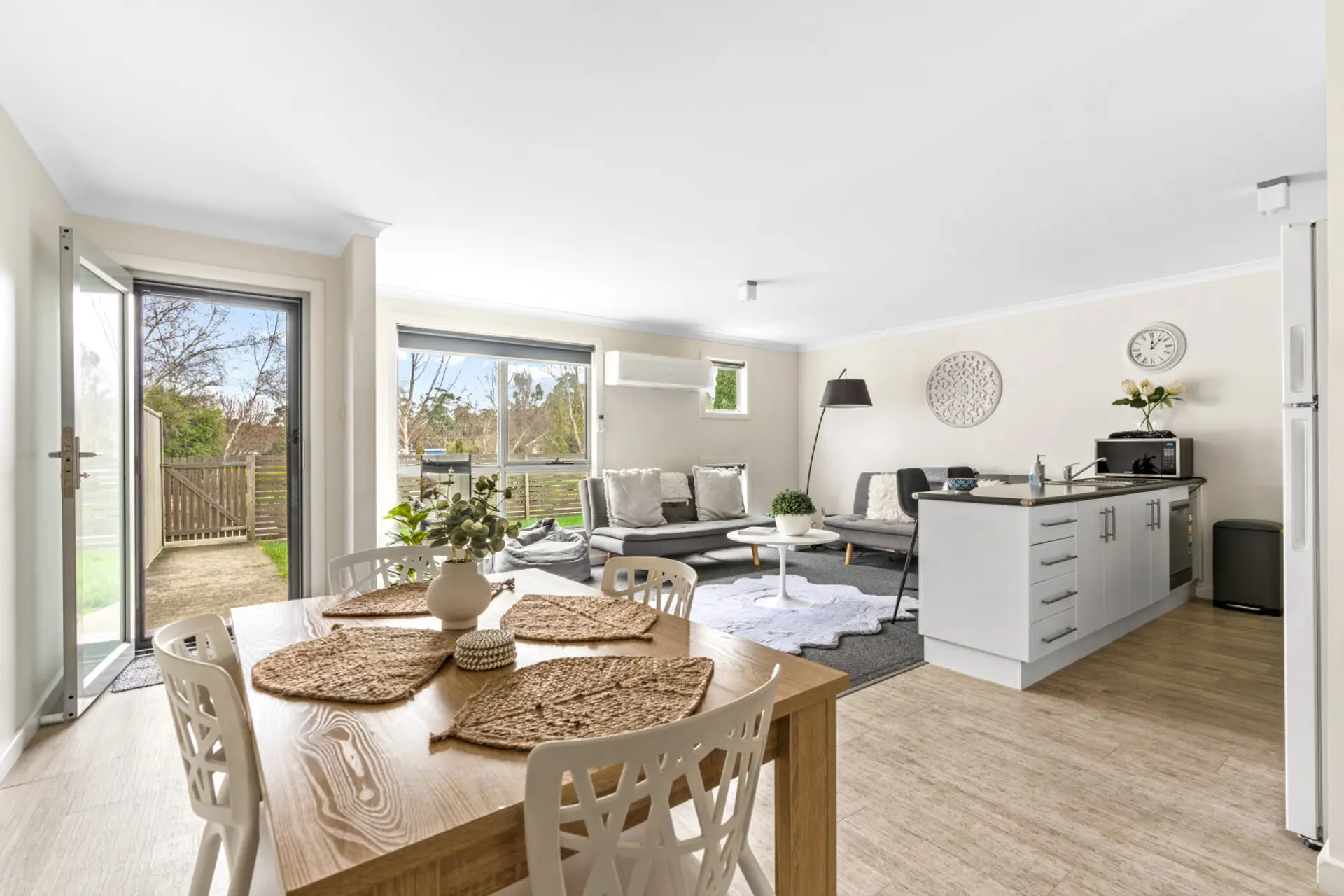 Open-plan living, dining and kitchen — light-filled and relaxed