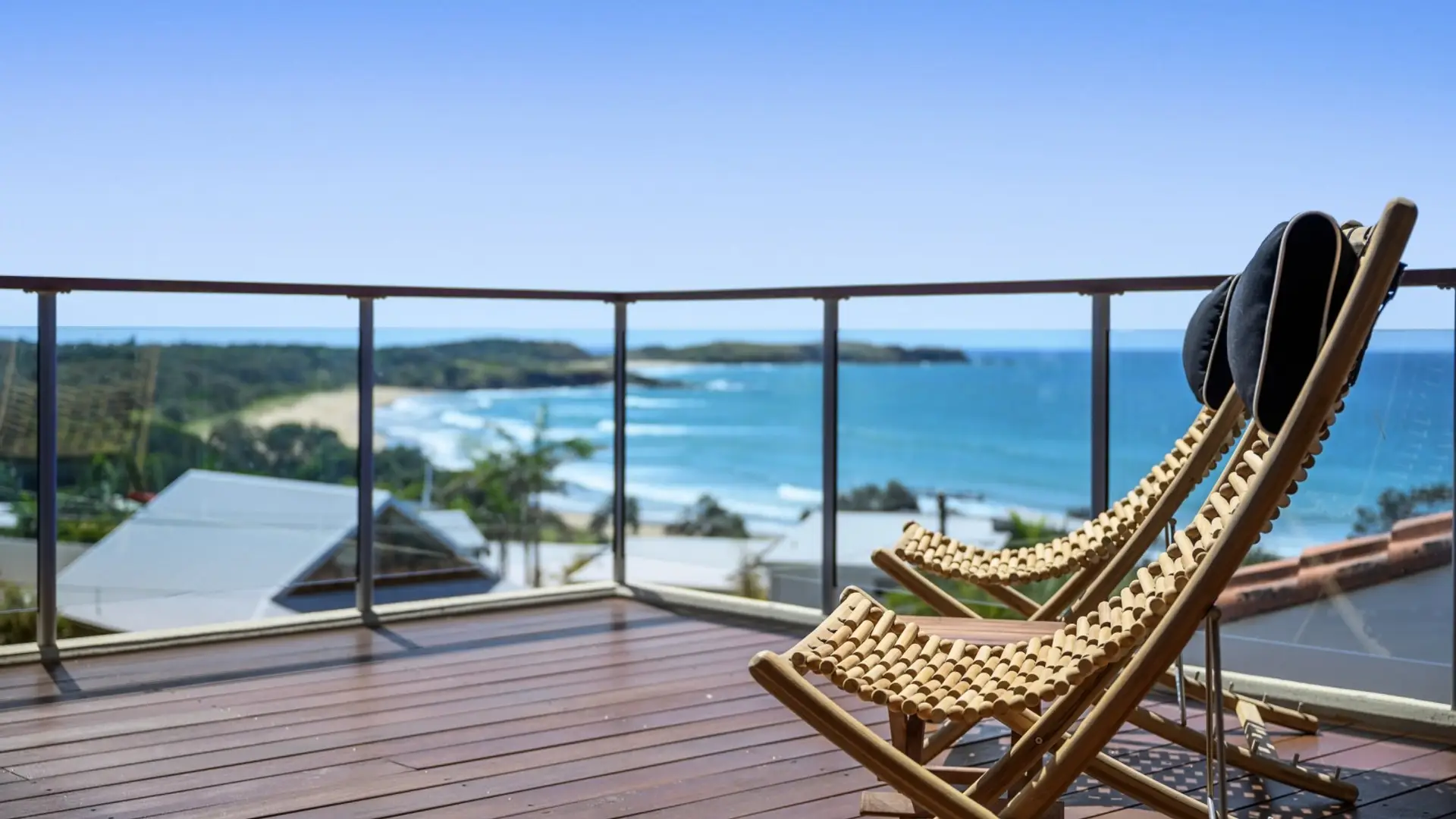 Expansive ocean-view sun deck — the signature Emerald Beach entertaining space with uninterrupted views along the Coffs Coast.