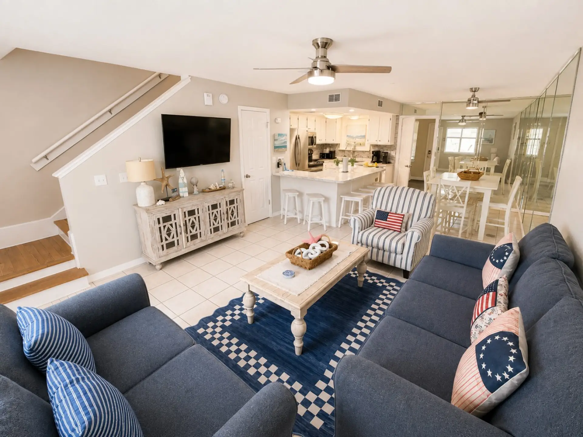 Nautical living room opening to kitchen and dining