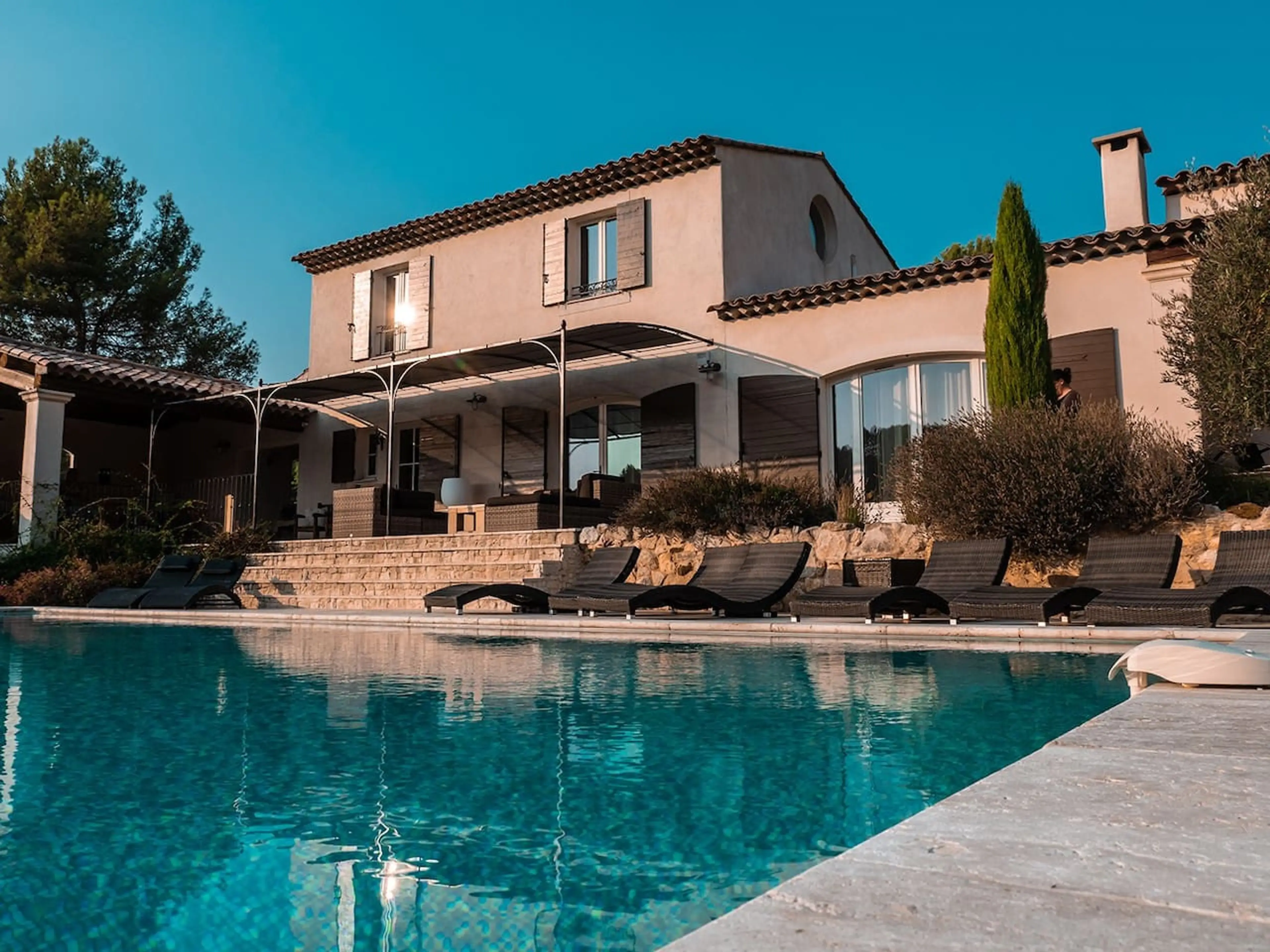 Exterior of the grand villa with pool
