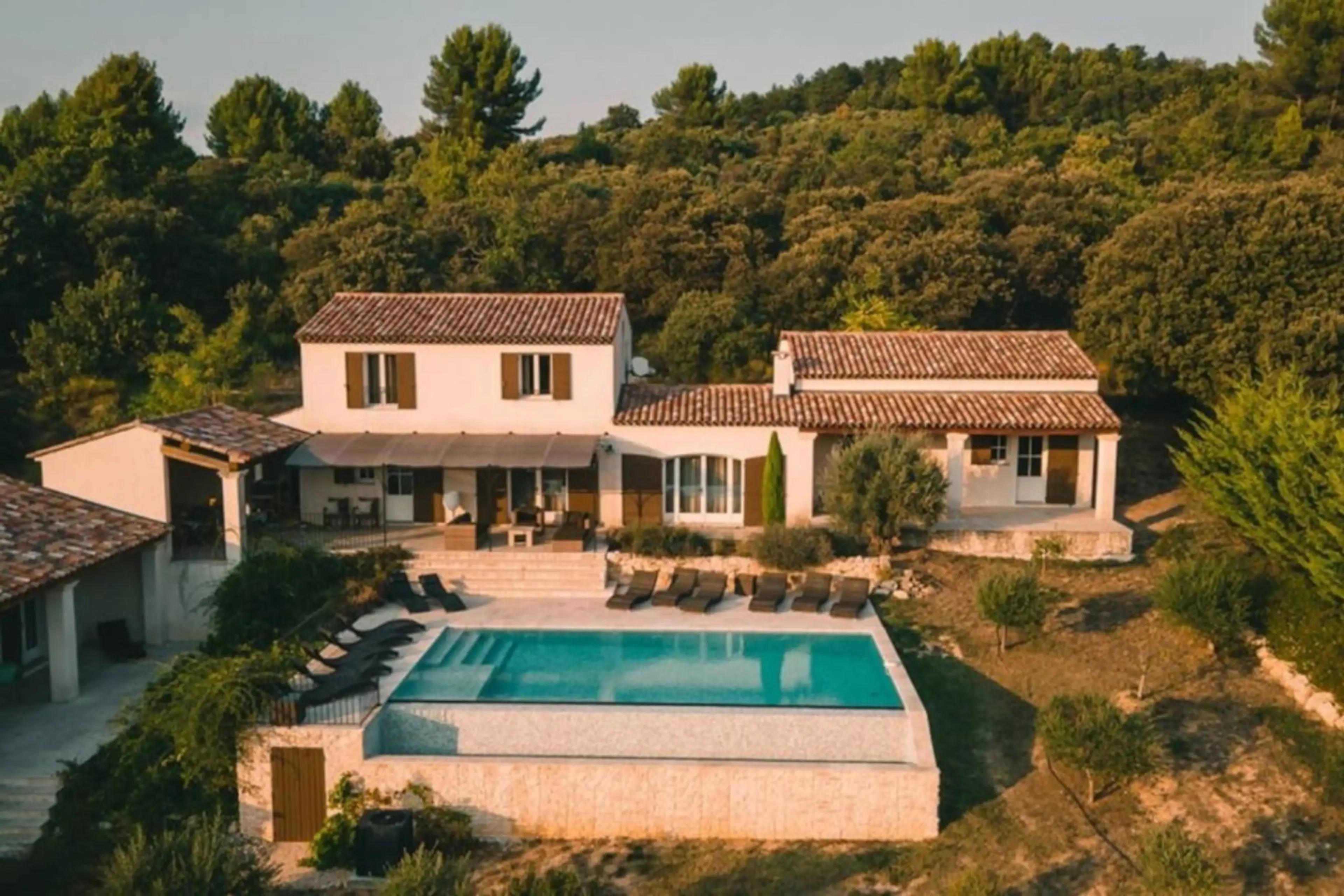 Exterior of the grand villa with pool
