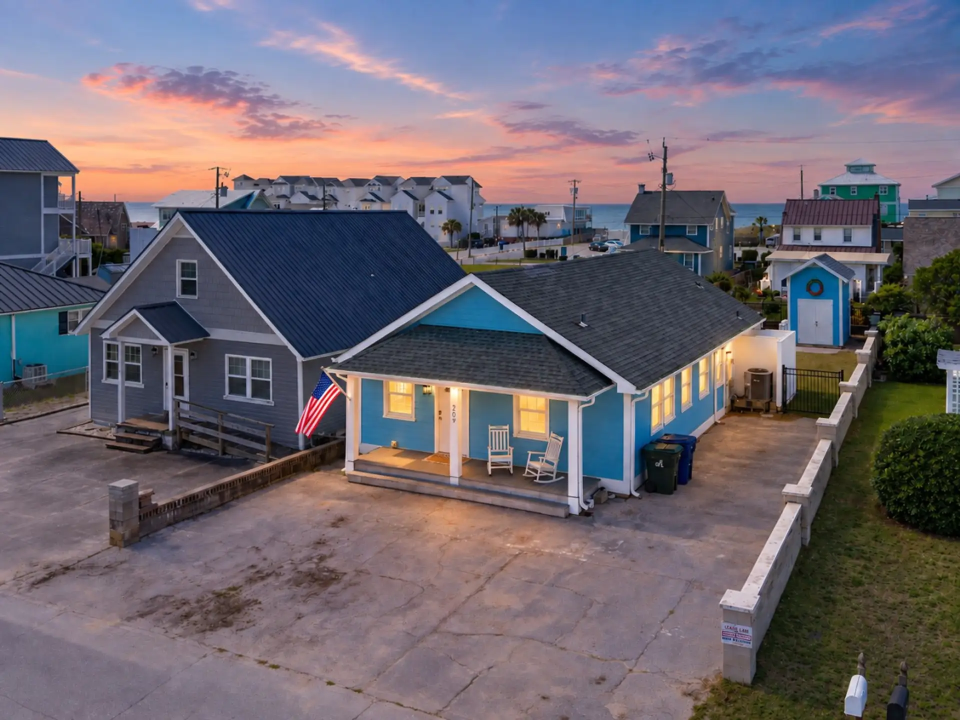 Welcome to Circle View Cottage — a sky-blue beach house two short blocks from the sand, and about the same from the Atlantic Beach Circle.