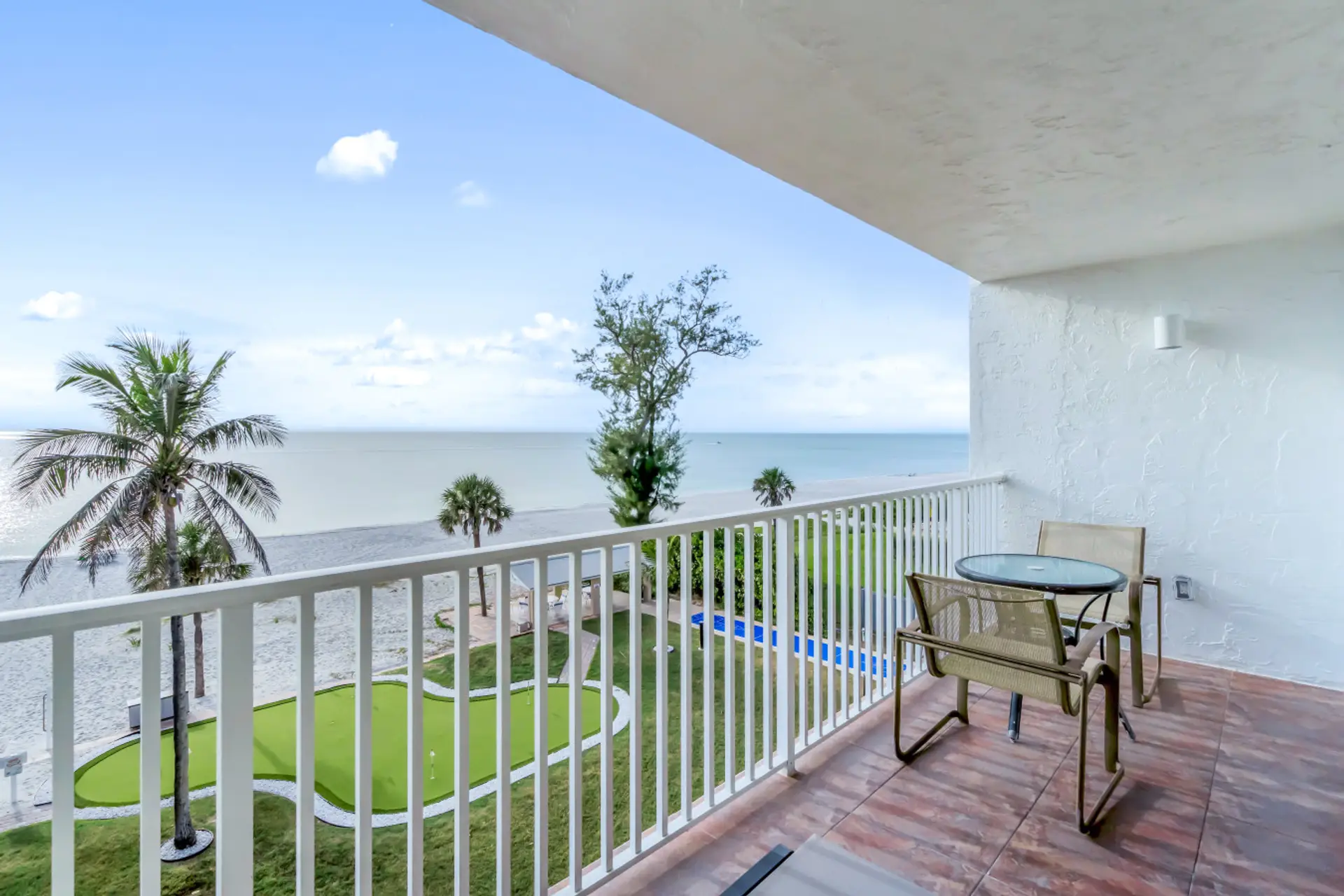 Private balcony with a peaceful outdoor setting, perfect for morning coffee or evening relaxation.