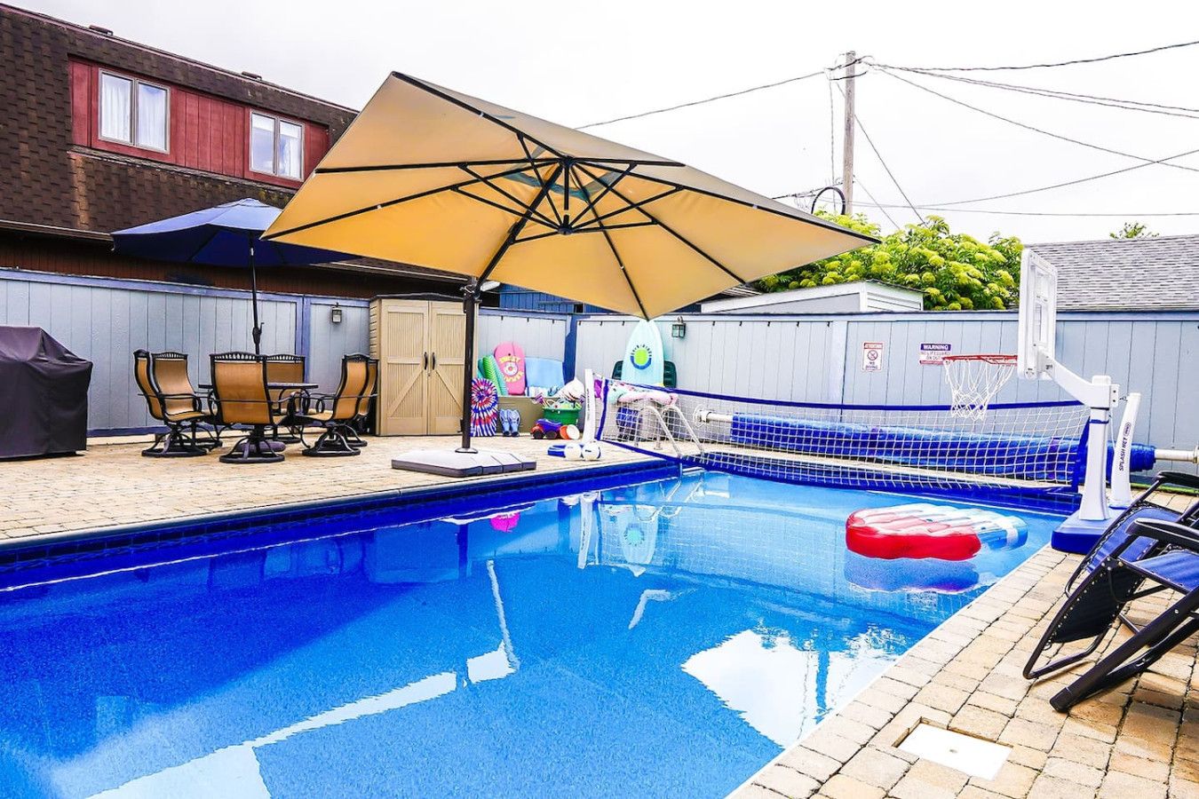 Private heated pool in back & Sandy beach in front