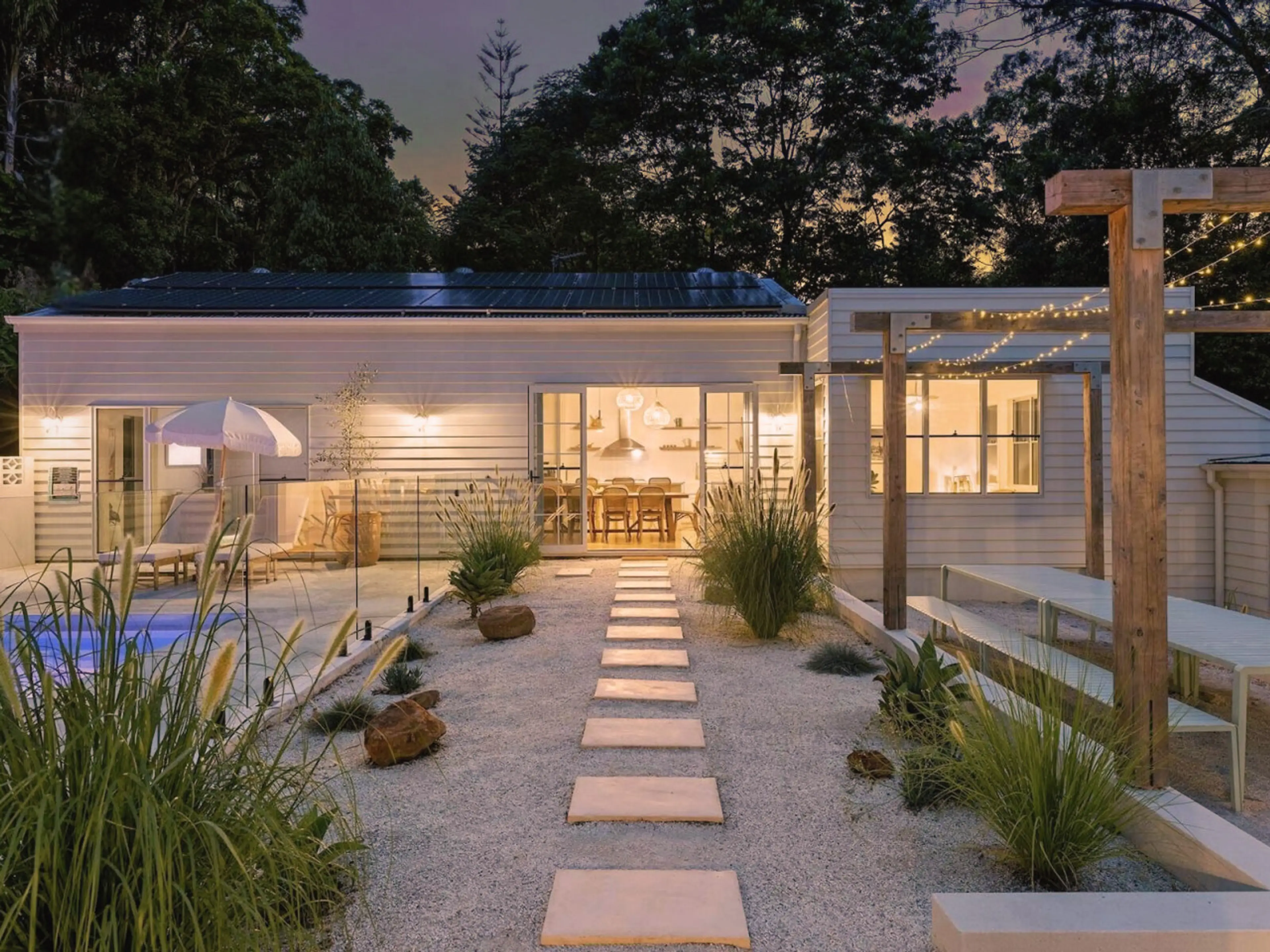 Exterior pathway leading to main house and private pool.