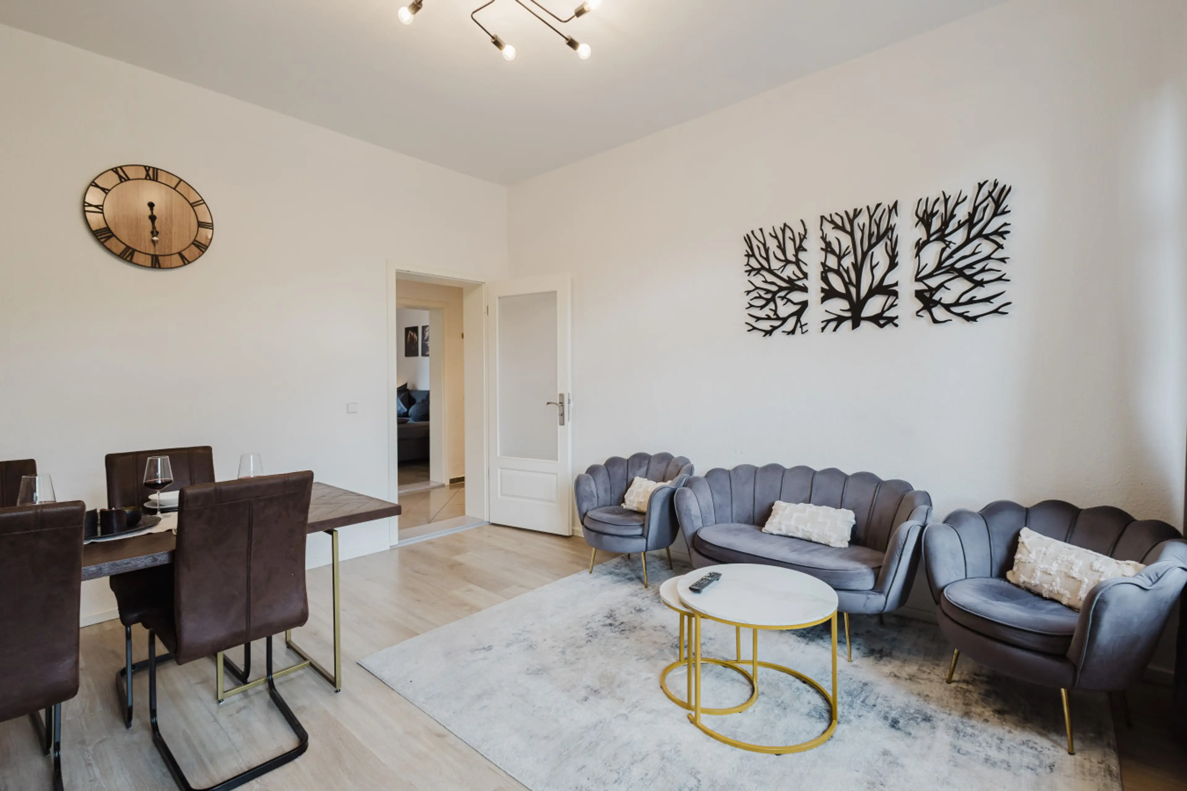 A cozy dining area paired with a chic lounge – perfect for shared meals and evening chats.