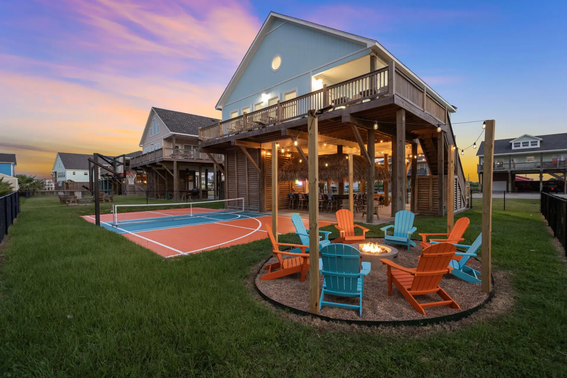 Pickleball, tiki-bar hangs, and firepit nights in one backyard.