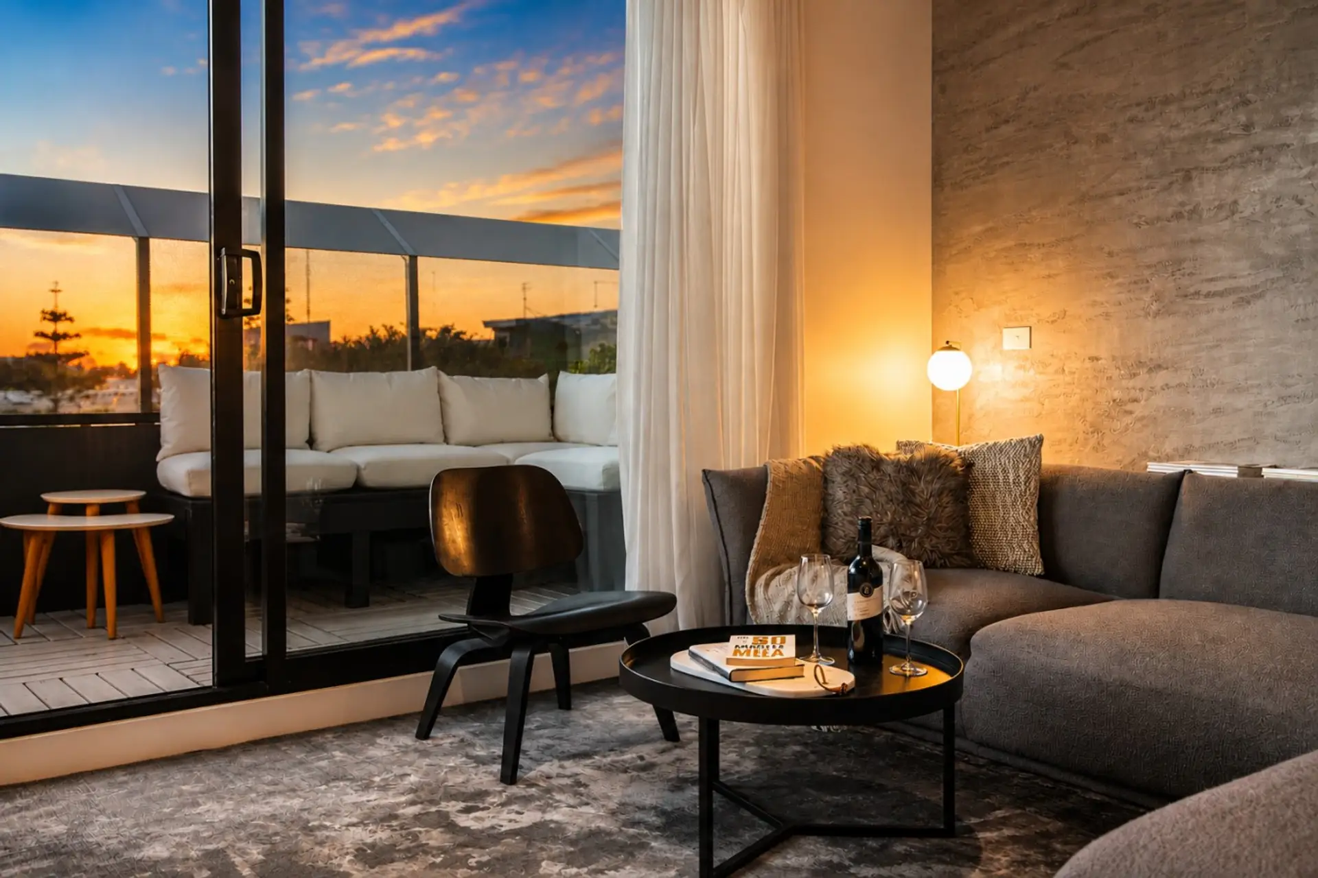 Unwind in a warm, modern lounge with sunset views and plenty of room to relax.