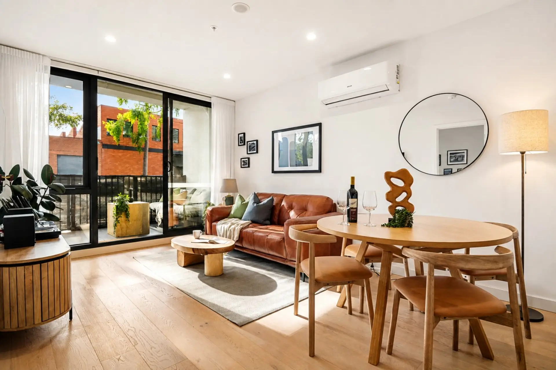 Relax on the comfortable couch with your choice of UHD television or some relaxing music on the record player.