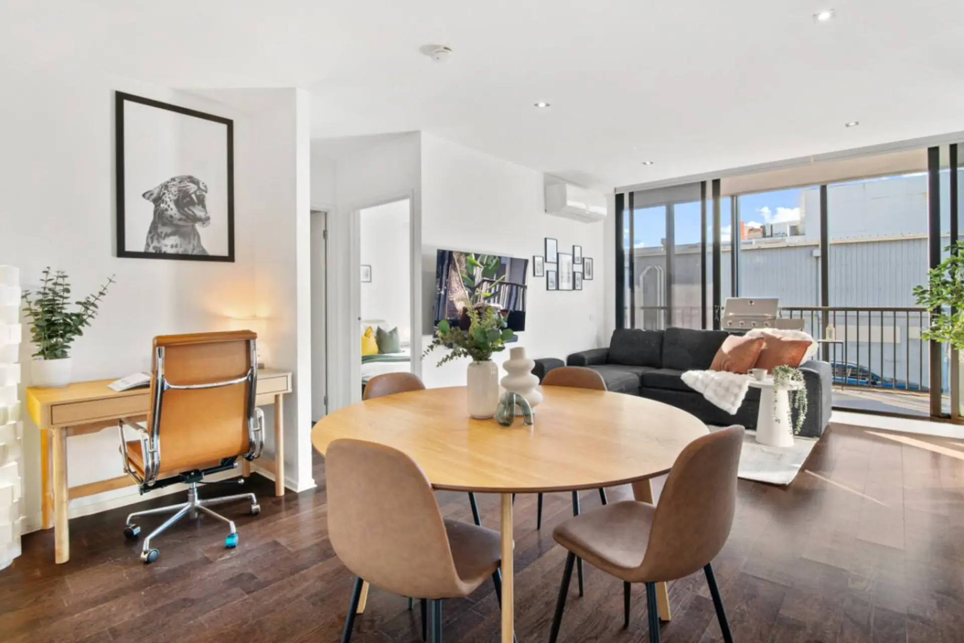 Clean, open living and dining space designed for calm and comfort.