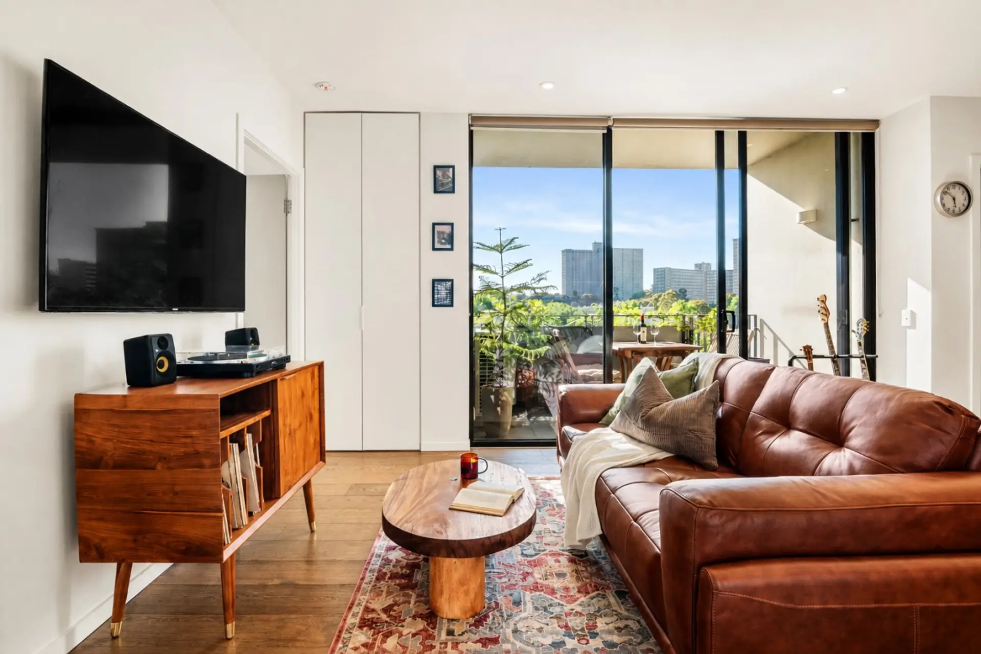 Relax on the comfortable couch with your choice of UHD television or some relaxing music on the record player.