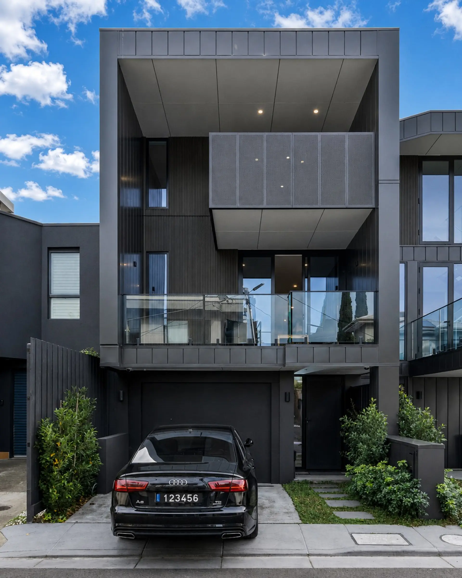 A striking multi-level townhouse with bold contemporary architecture