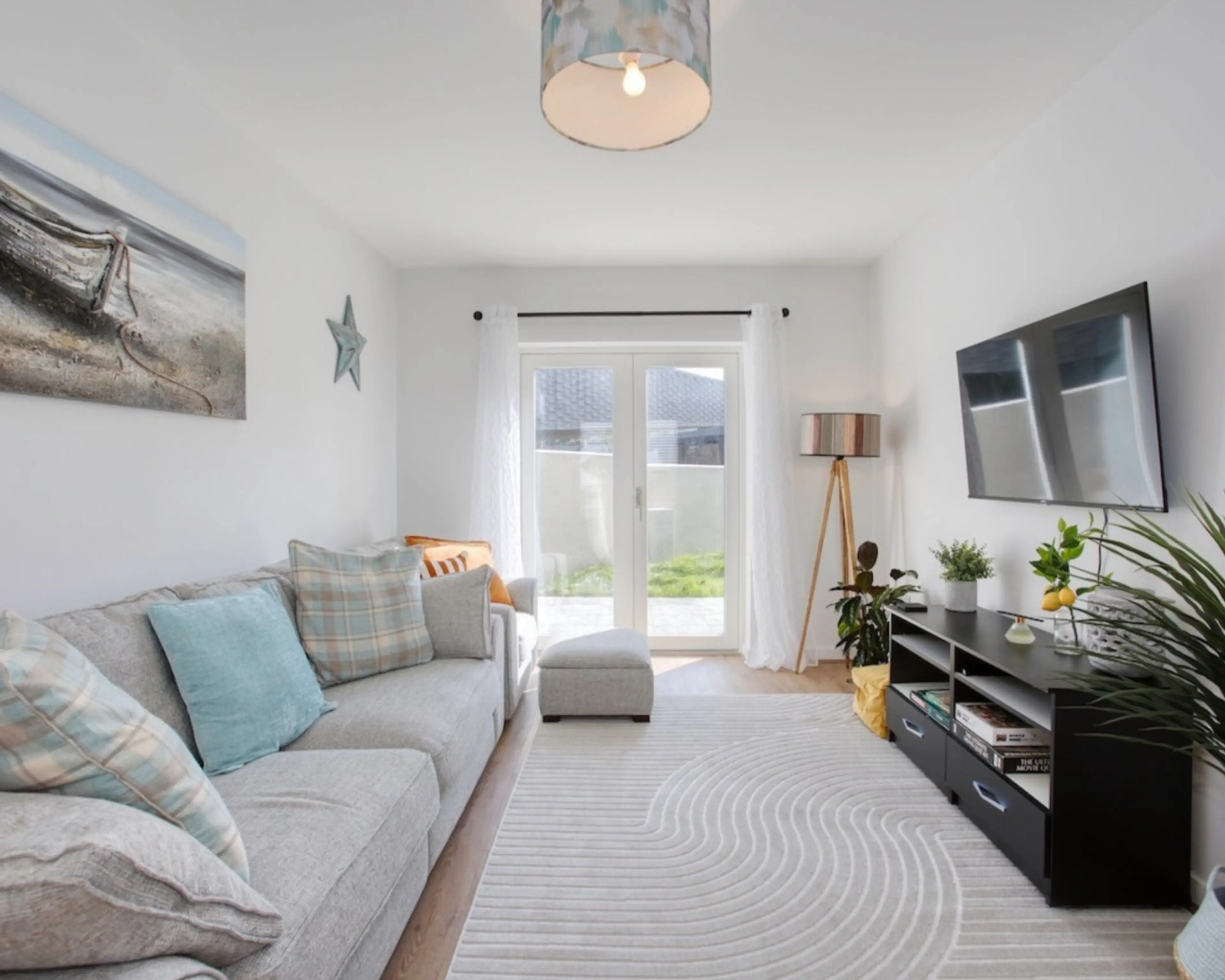 Stylish lounge with spacious sofa, large flatscreen TV, Sky & Netflix