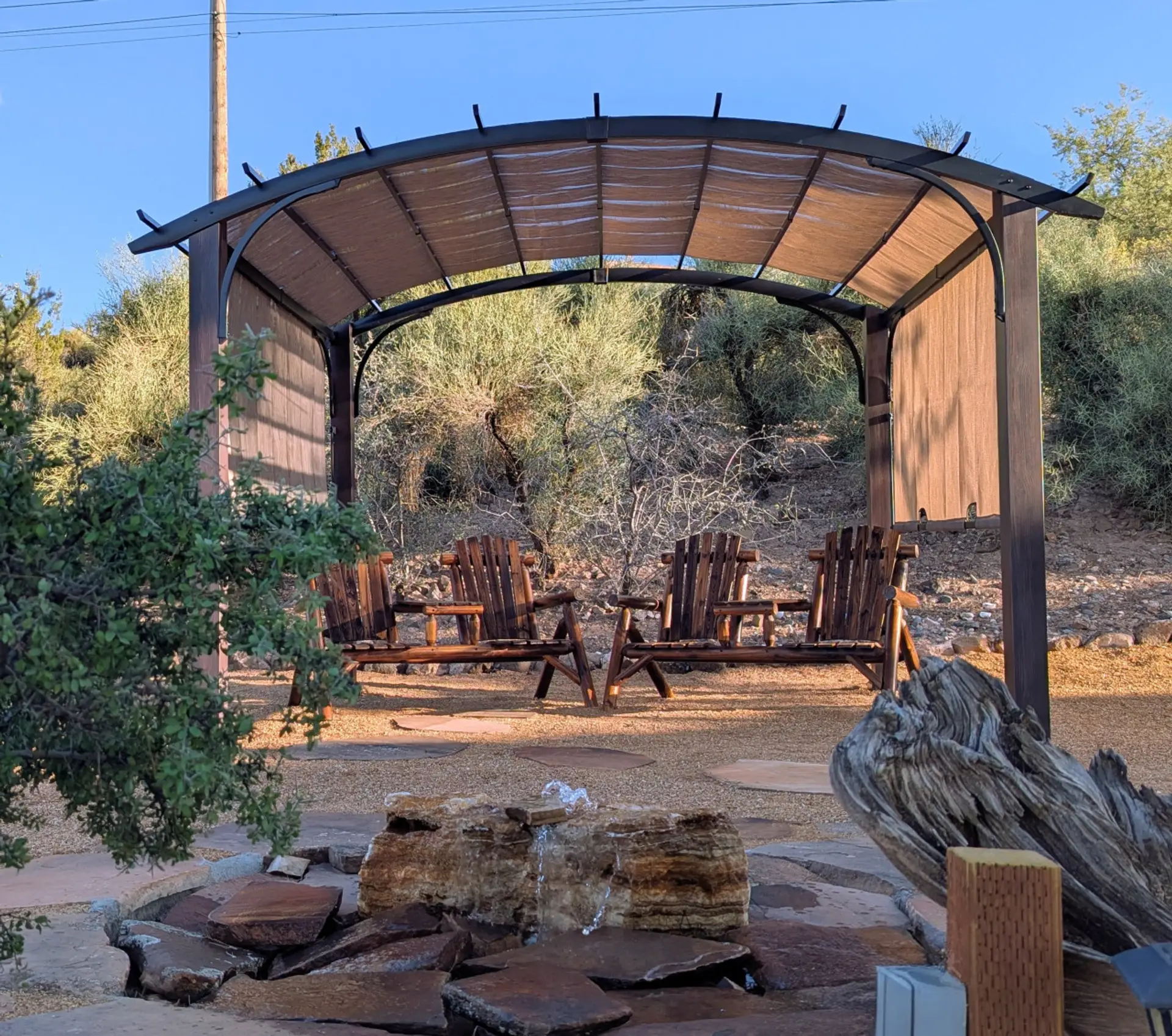 NEW! Seating for four in shady pergola in birding oasis. Enjoy the serenity of the bubbler, feeders, and view toward Sedona. (Shared with upstairs guests.)