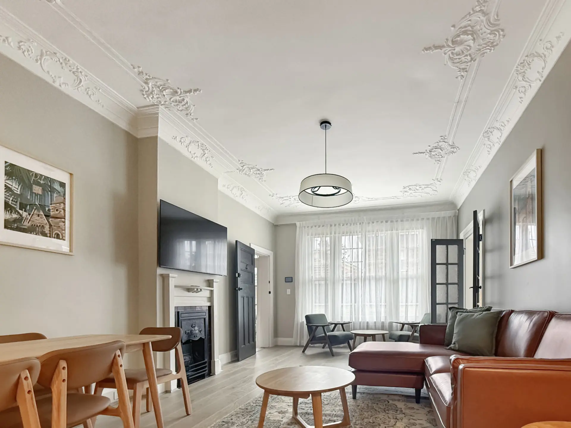 living and dining room with 55" smart tv