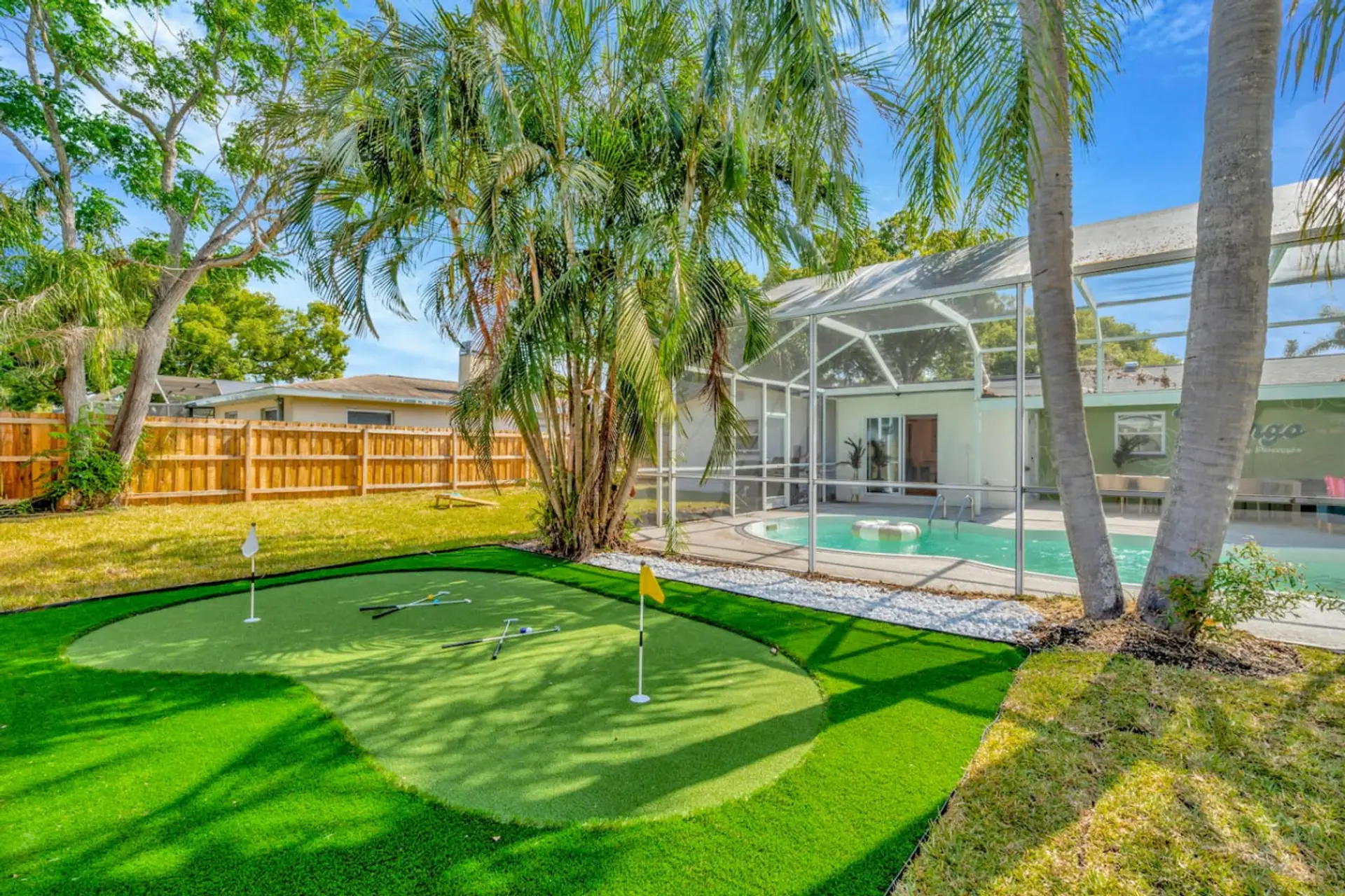 Tee off right in your backyard — practice on your private putting green surrounded by palms and sunshine