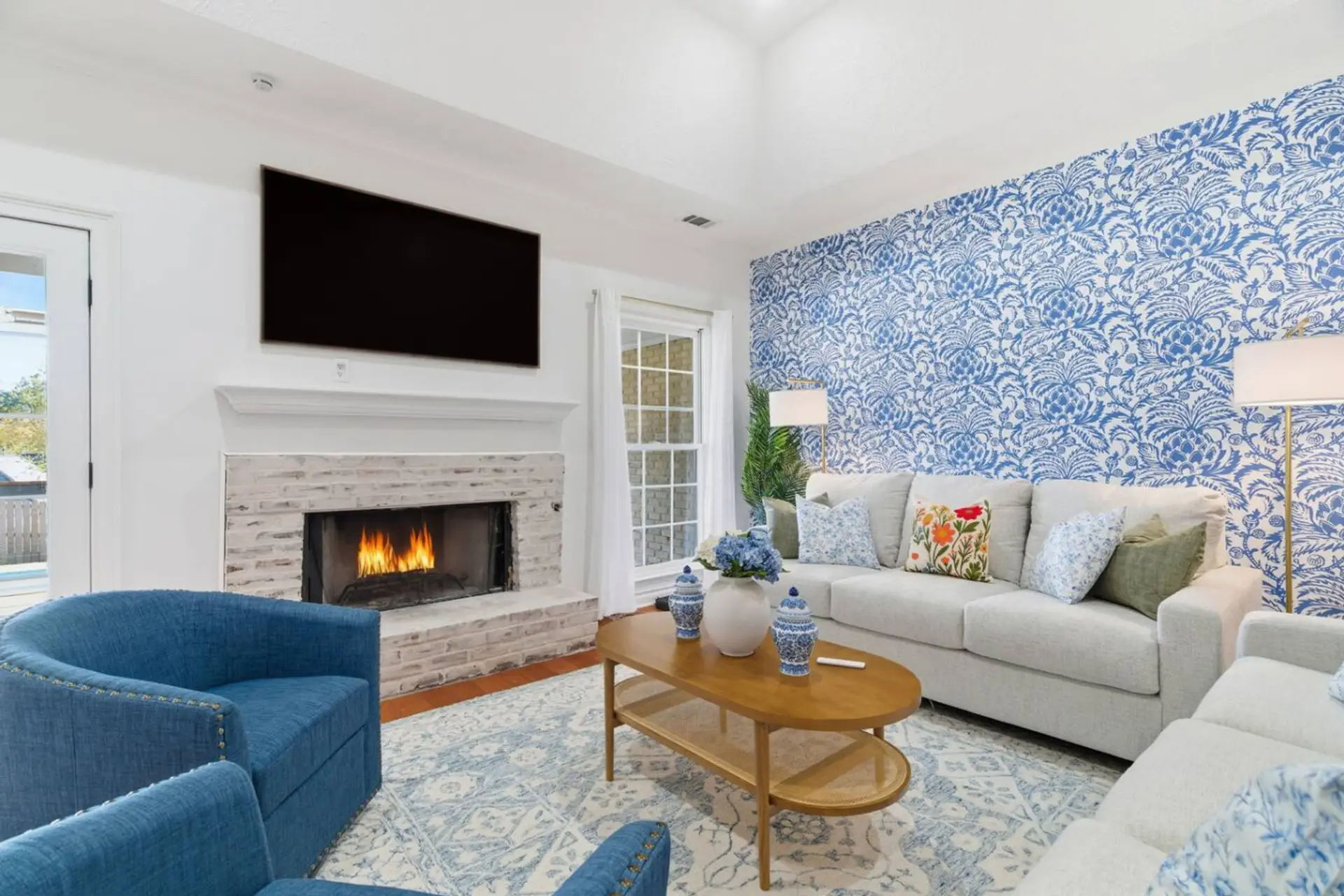 Bright, Spacious Living Room — Designed for comfort and conversation, with natural light and stylish decor.