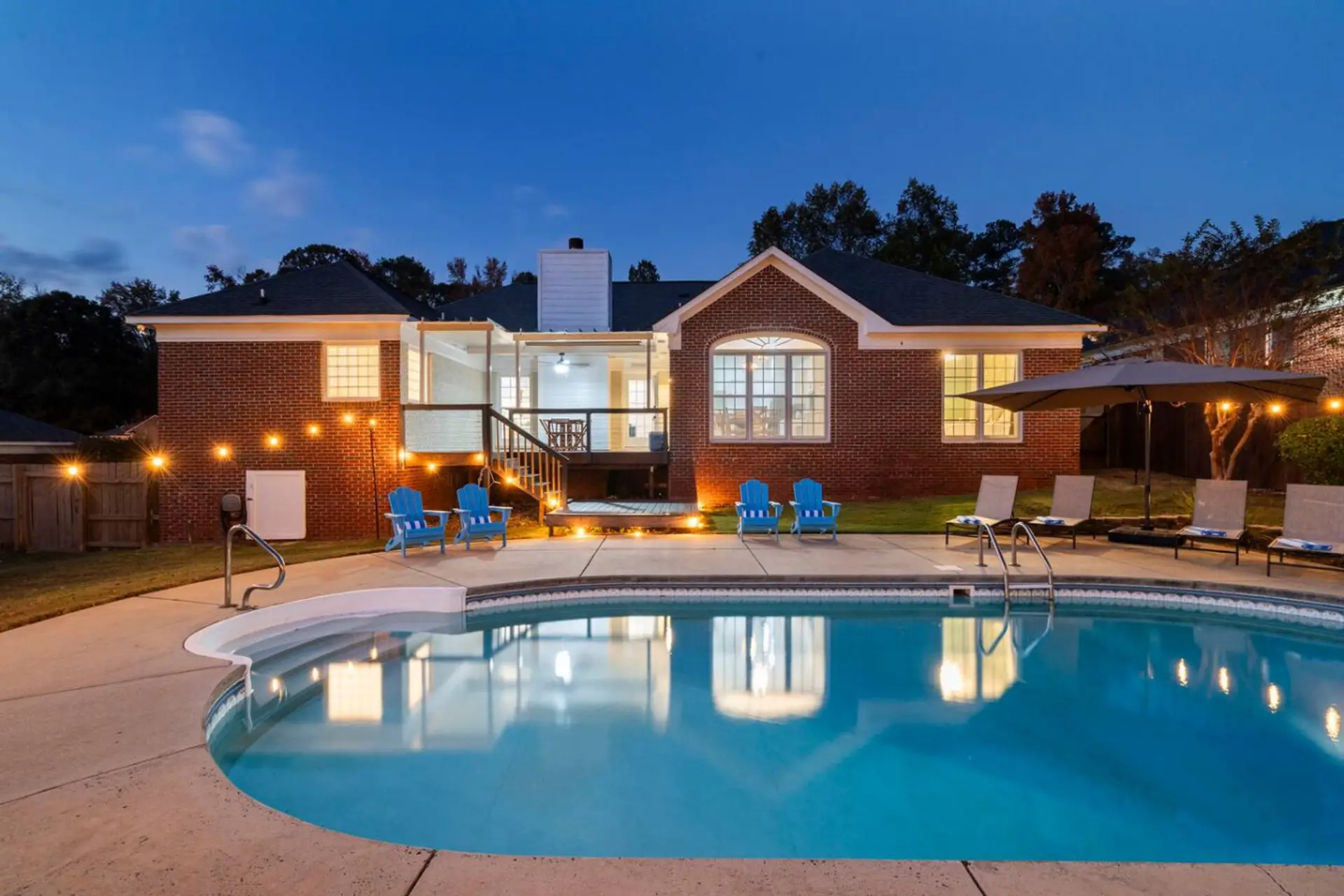 Your Private Pool Paradise Awaits 🌴 — Sunset reflections and resort-style lighting create the perfect Southern retreat.