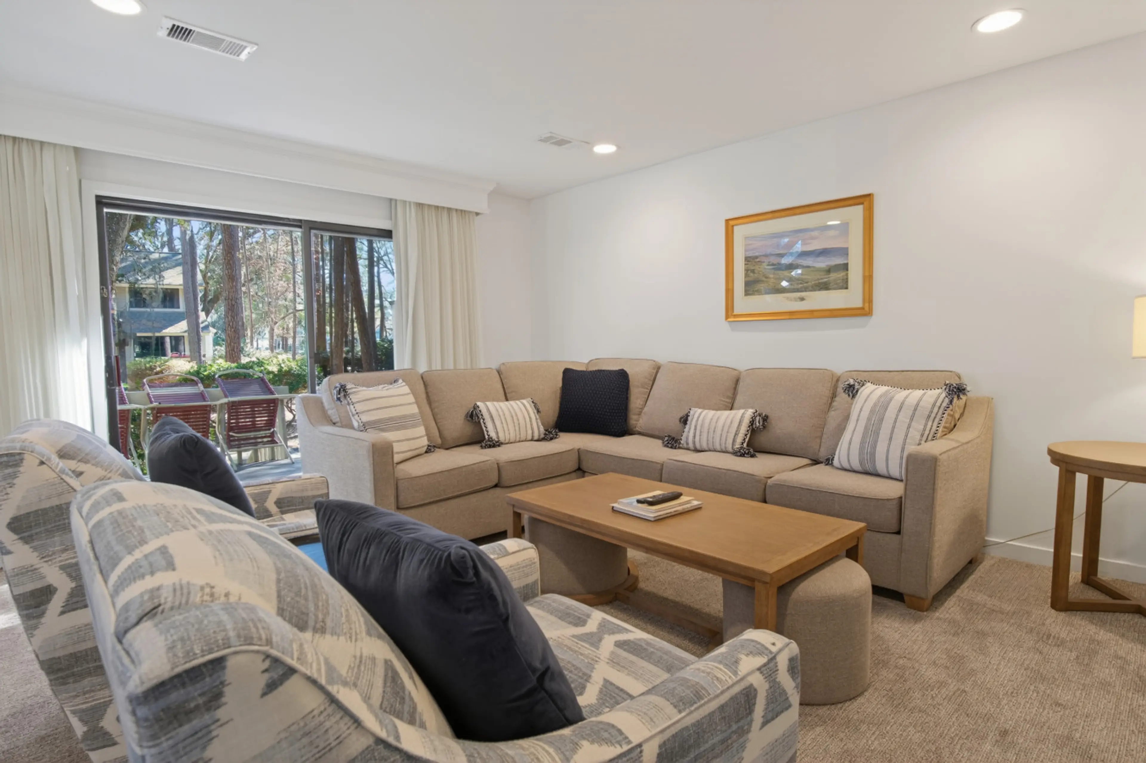 Living room updates: new sofa (2025), armchairs (2026), and carpet (2026)