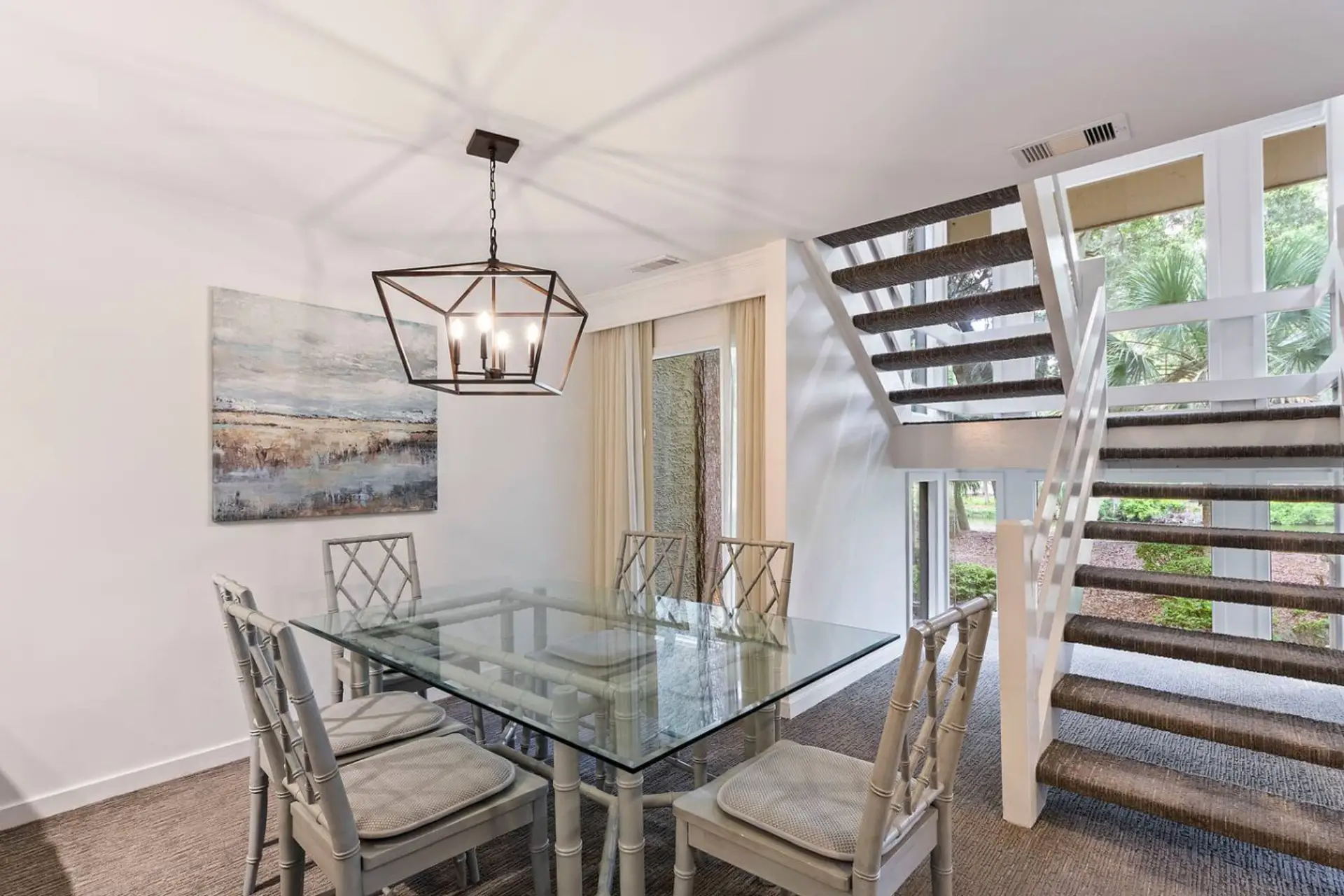 Enjoy meals together in the dining area located just off the kitchen and living room, providing a comfortable space for family breakfasts, dinners, and game nights.
