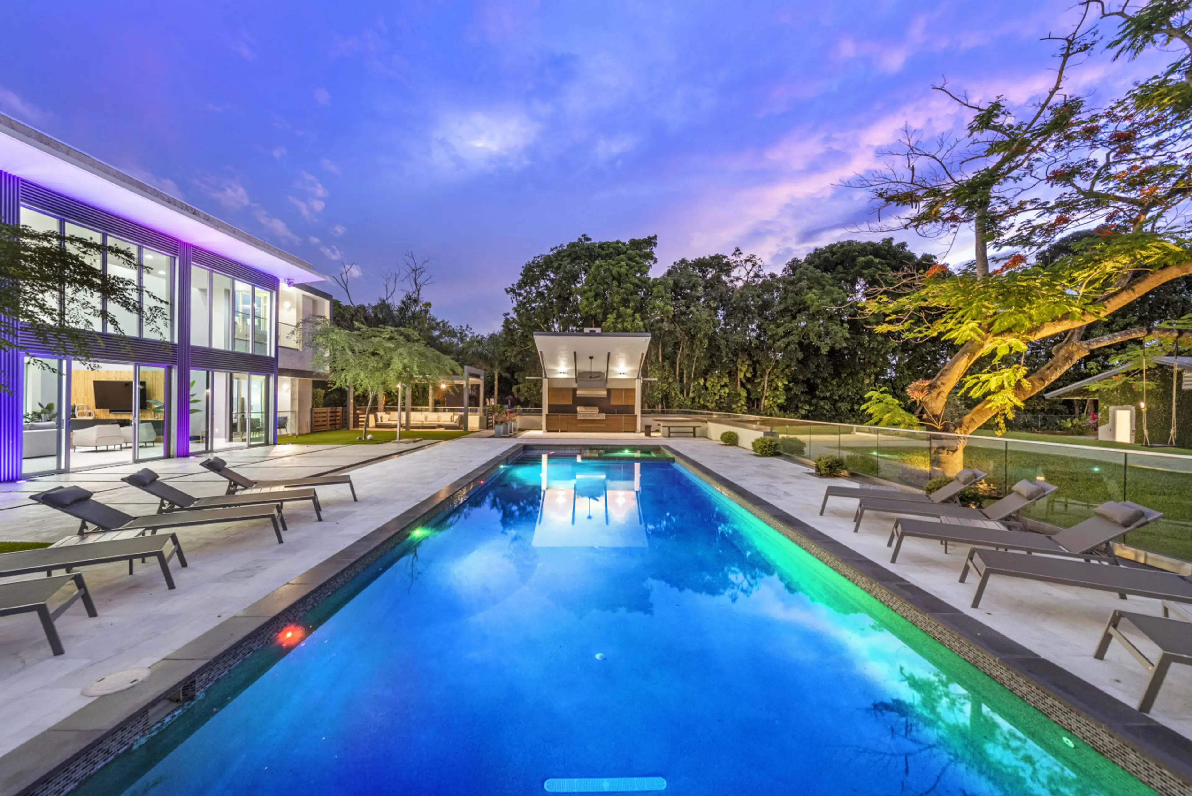 Swim under the sky in your own private pool, surrounded by luxury loungers and lush views