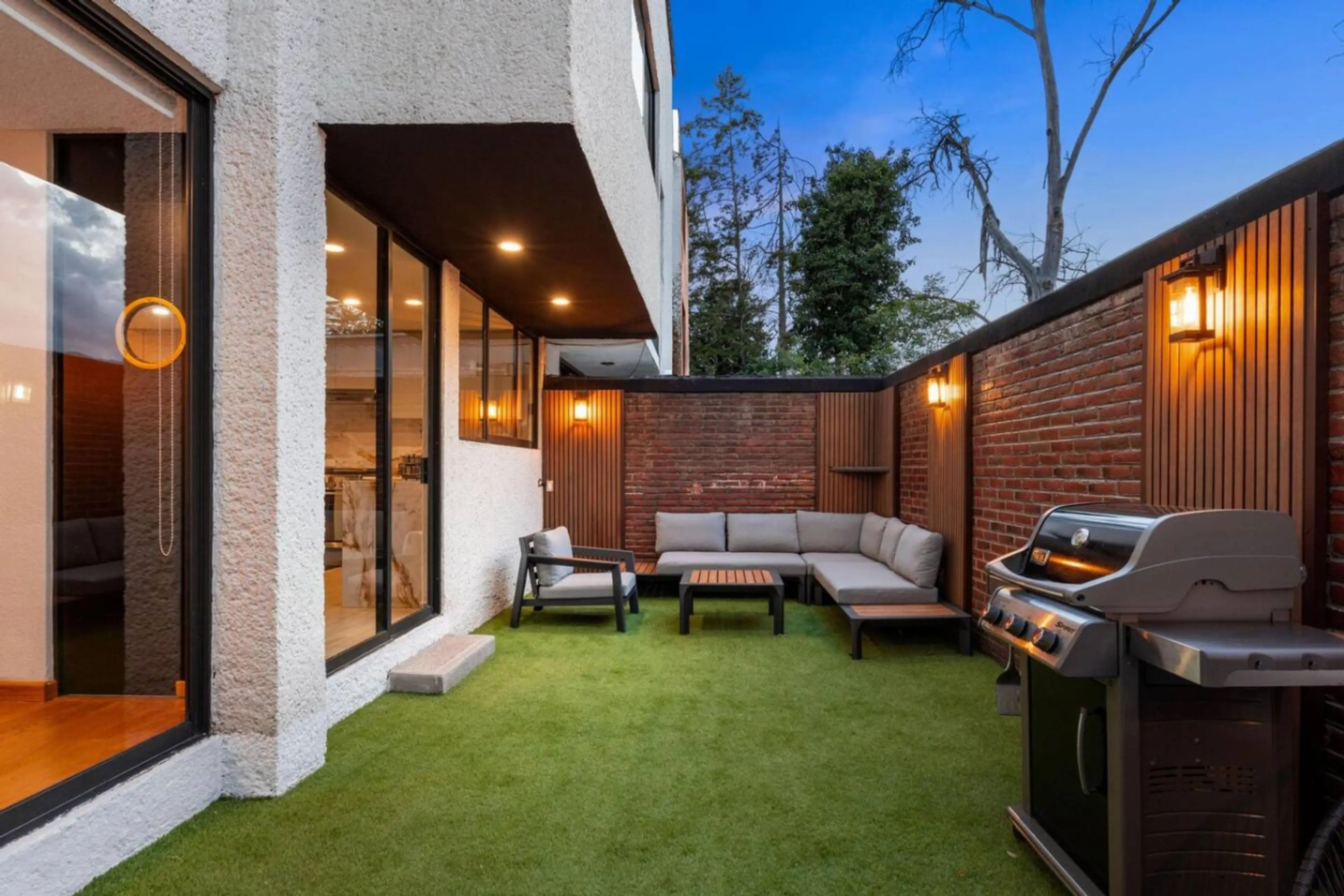 Outdoor BBQ grill available for guest use at this property.