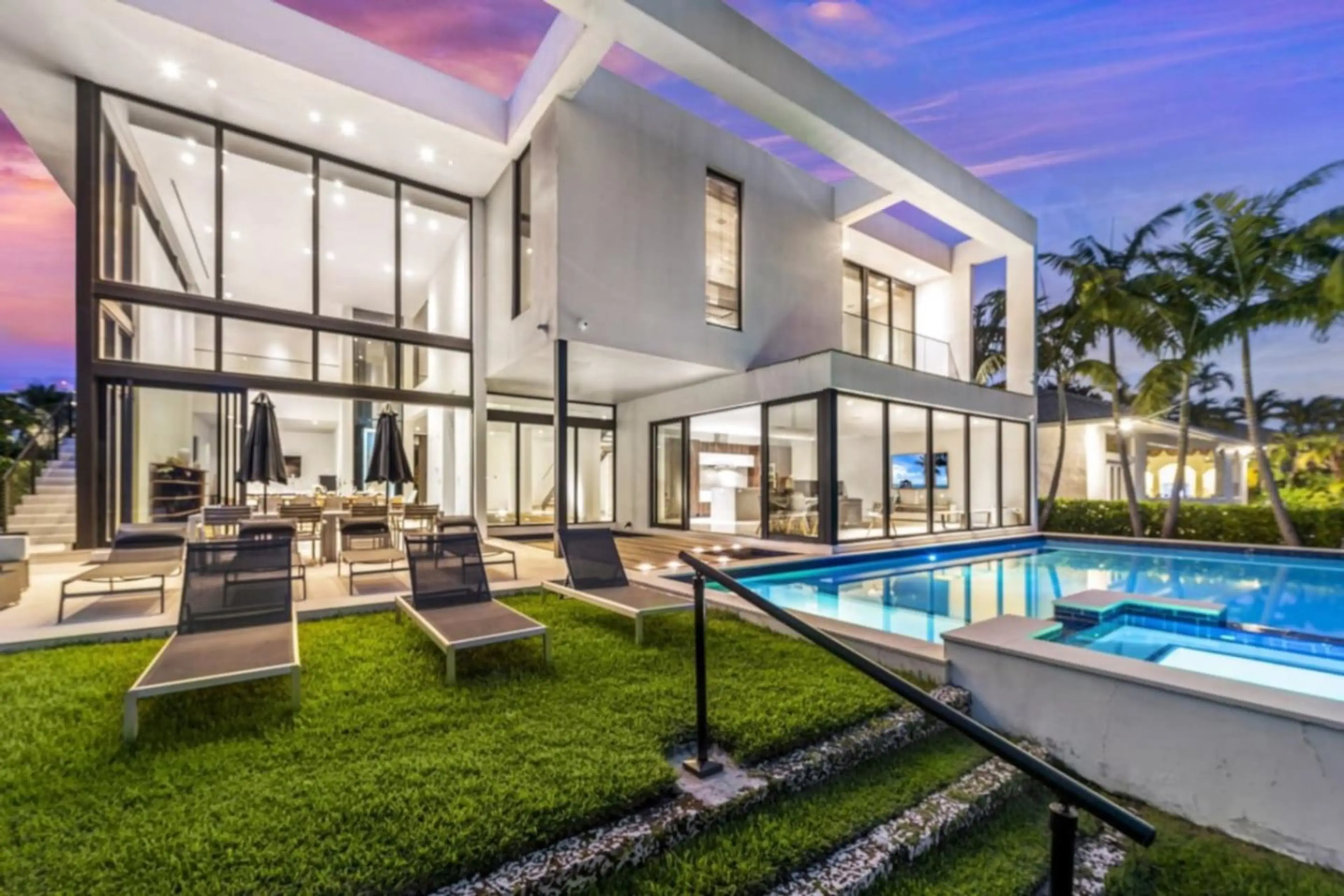 Rear Exterior and Private Pool. Modern architecture, high-end outdoor furnishings, and excellent lighting.  Export to Sheets