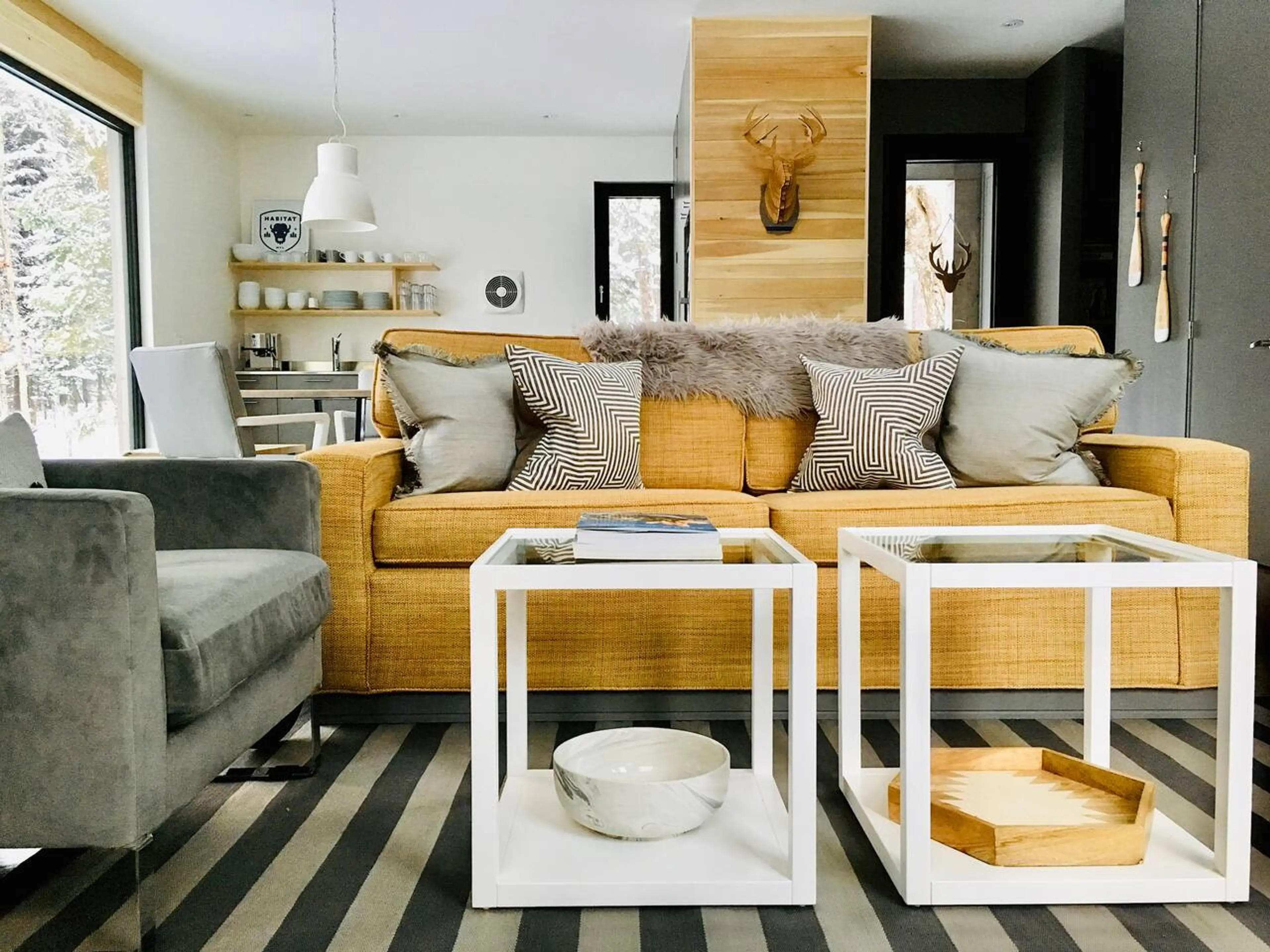 The first level of Spahaus 7 features open-concept living with heated concrete floors