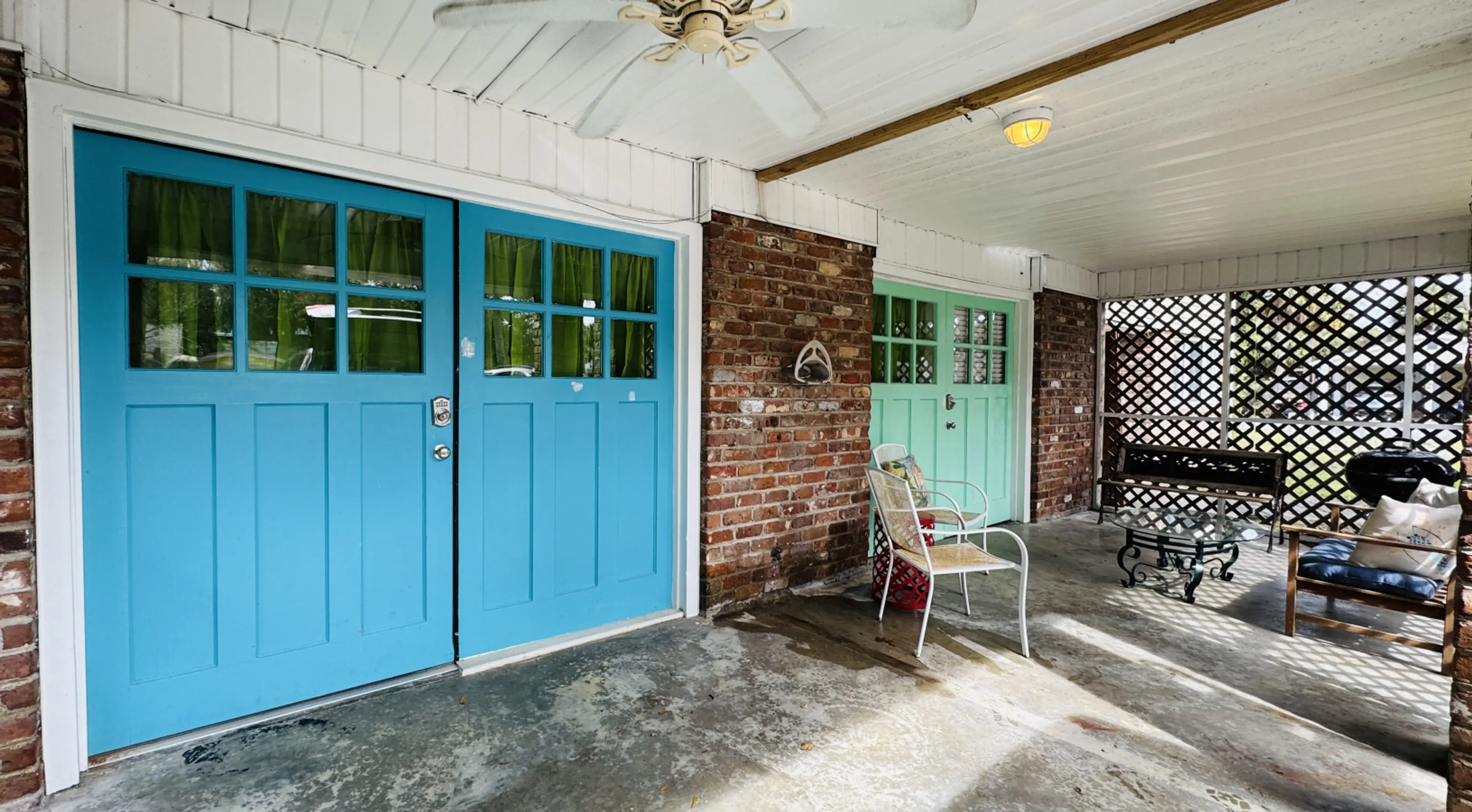 The Fish Cottage - One Fish downstairs left one bedroom, studio unit with the blue door and covered patio patio