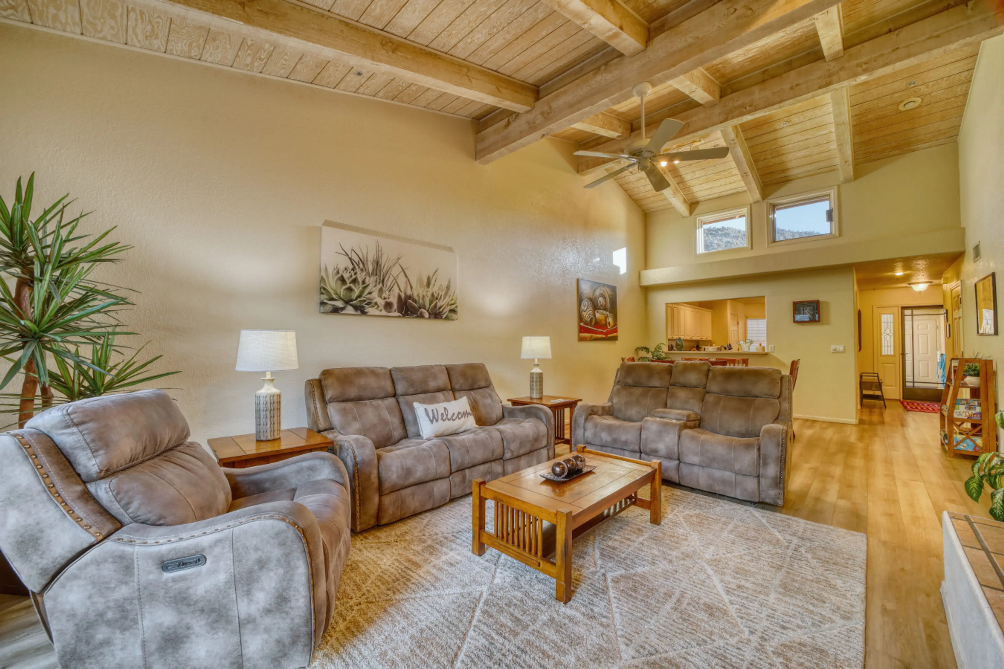 Spacious Living Room with Vaulted Celling and reclining sofa and chair