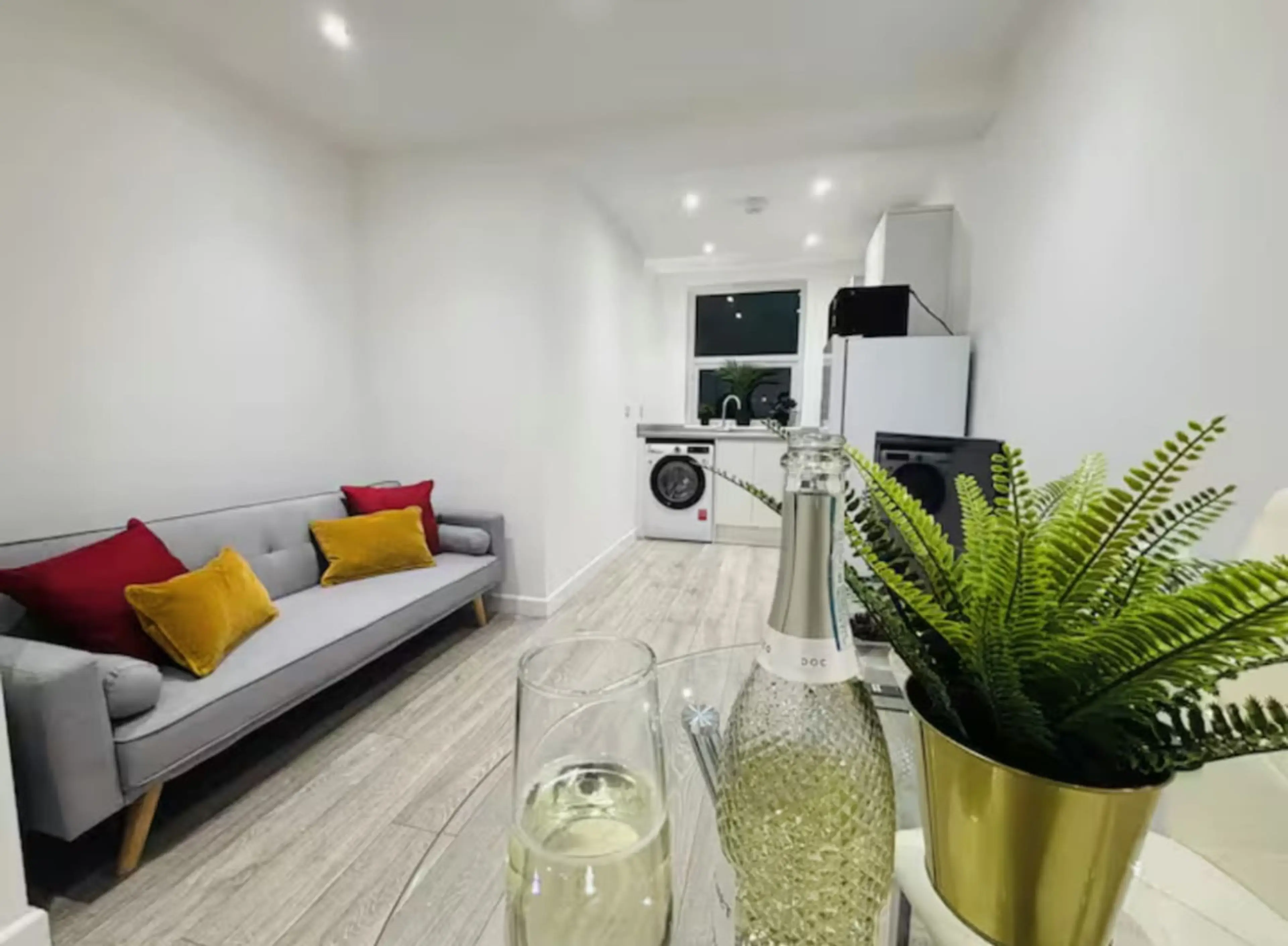 Bright and comfortable lounge with TV and high-speed WiFi, perfect for relaxing or working.