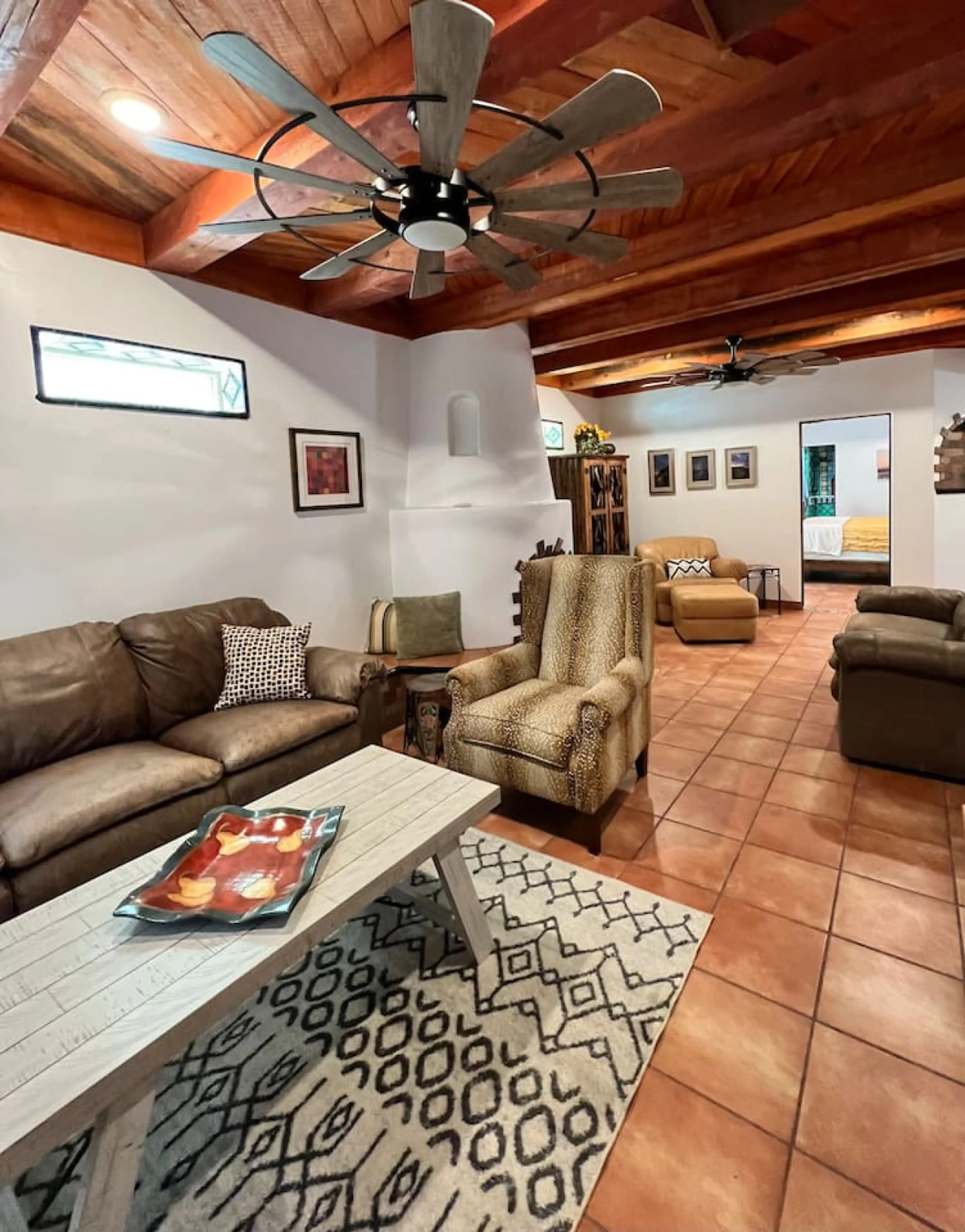 Living Room - Seating Area, Bookshelf, and Fireplace (DO NOT USE FIREPLACE)