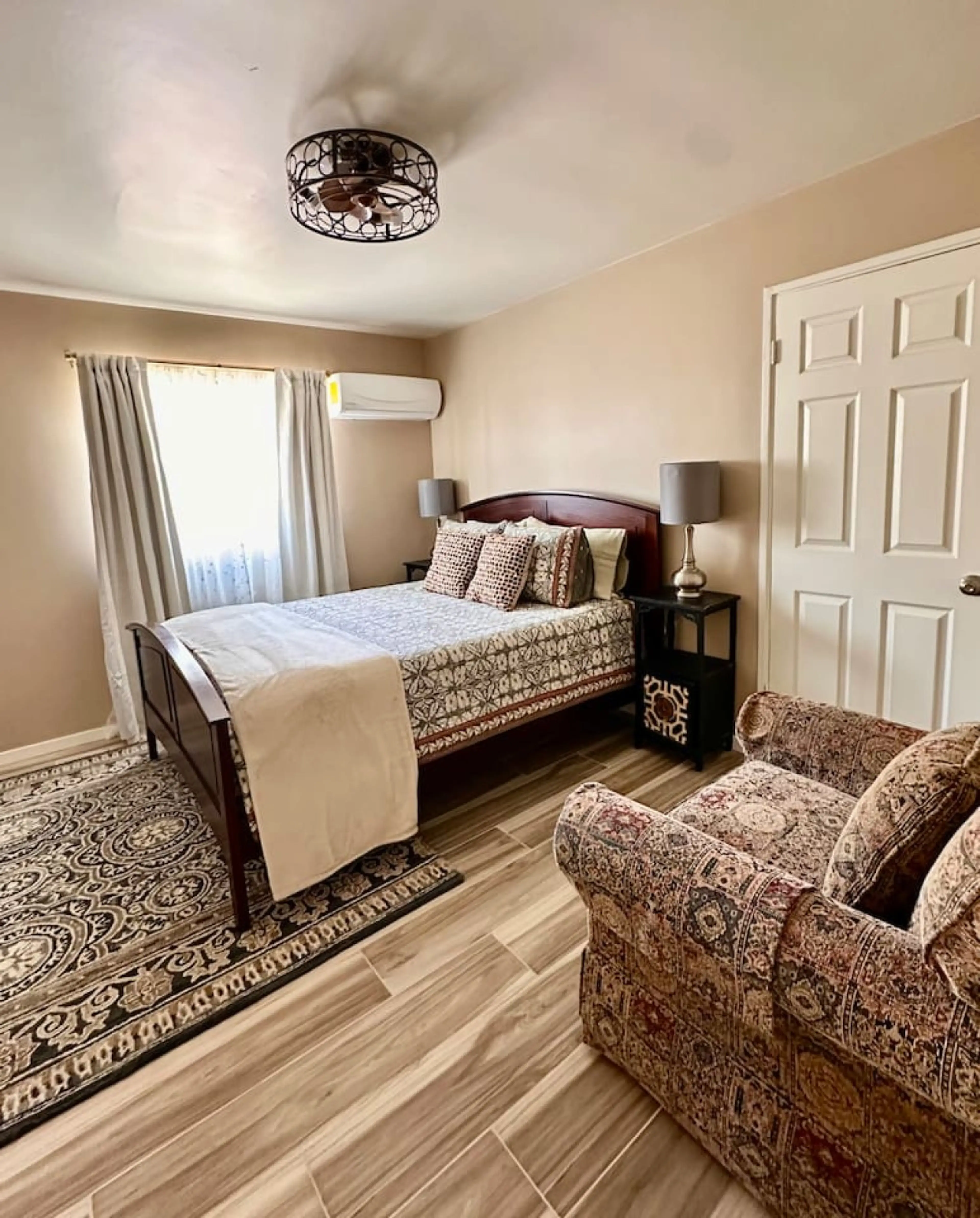 Bedroom - Bed, Seating, Closet, and TV