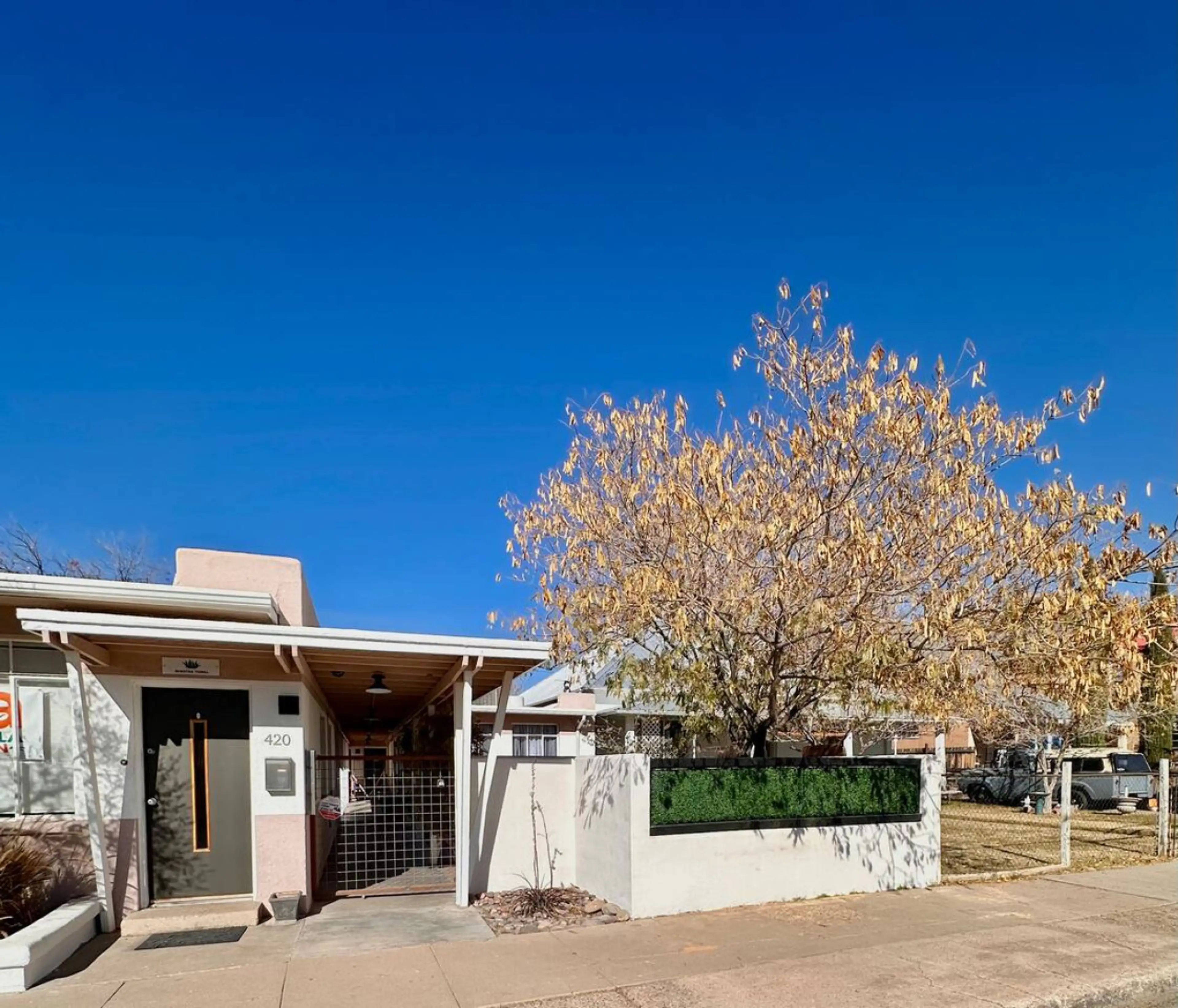 Front of the Triplex During the Day - Go through the gate to the middle unit and that's your property