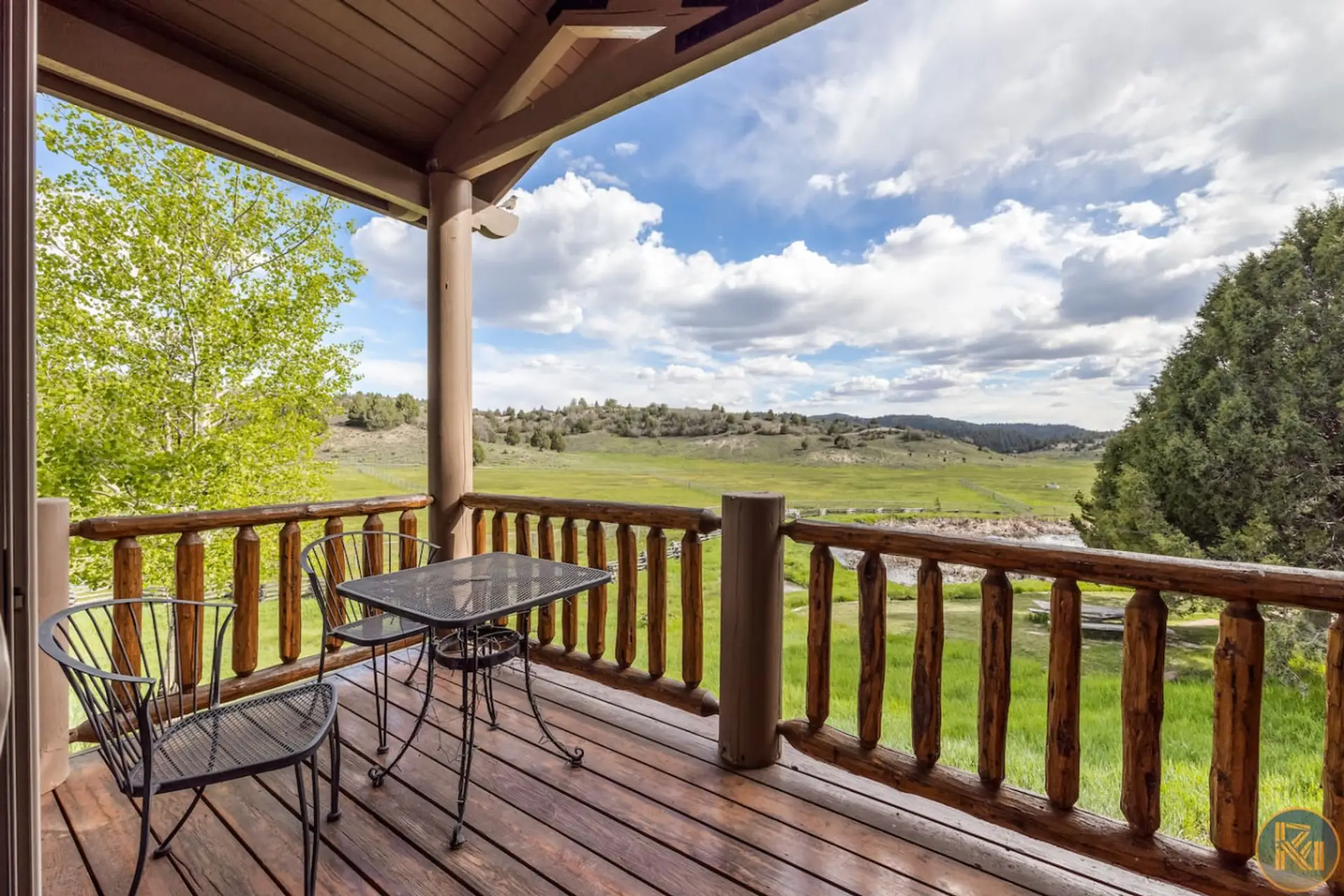 Nothing better than a back deck view overlooking the pond and the ranch. Quiet mornings, fresh air, and western skies.