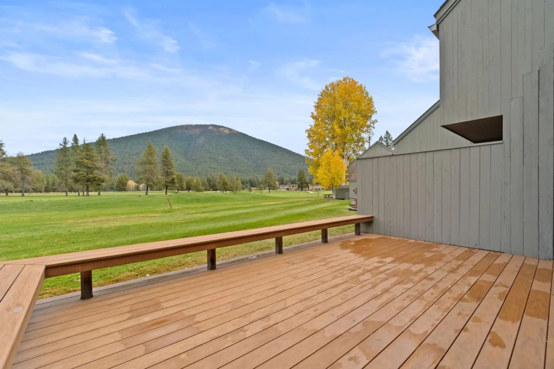 Deck views over the golf course with Black Butte front and center.