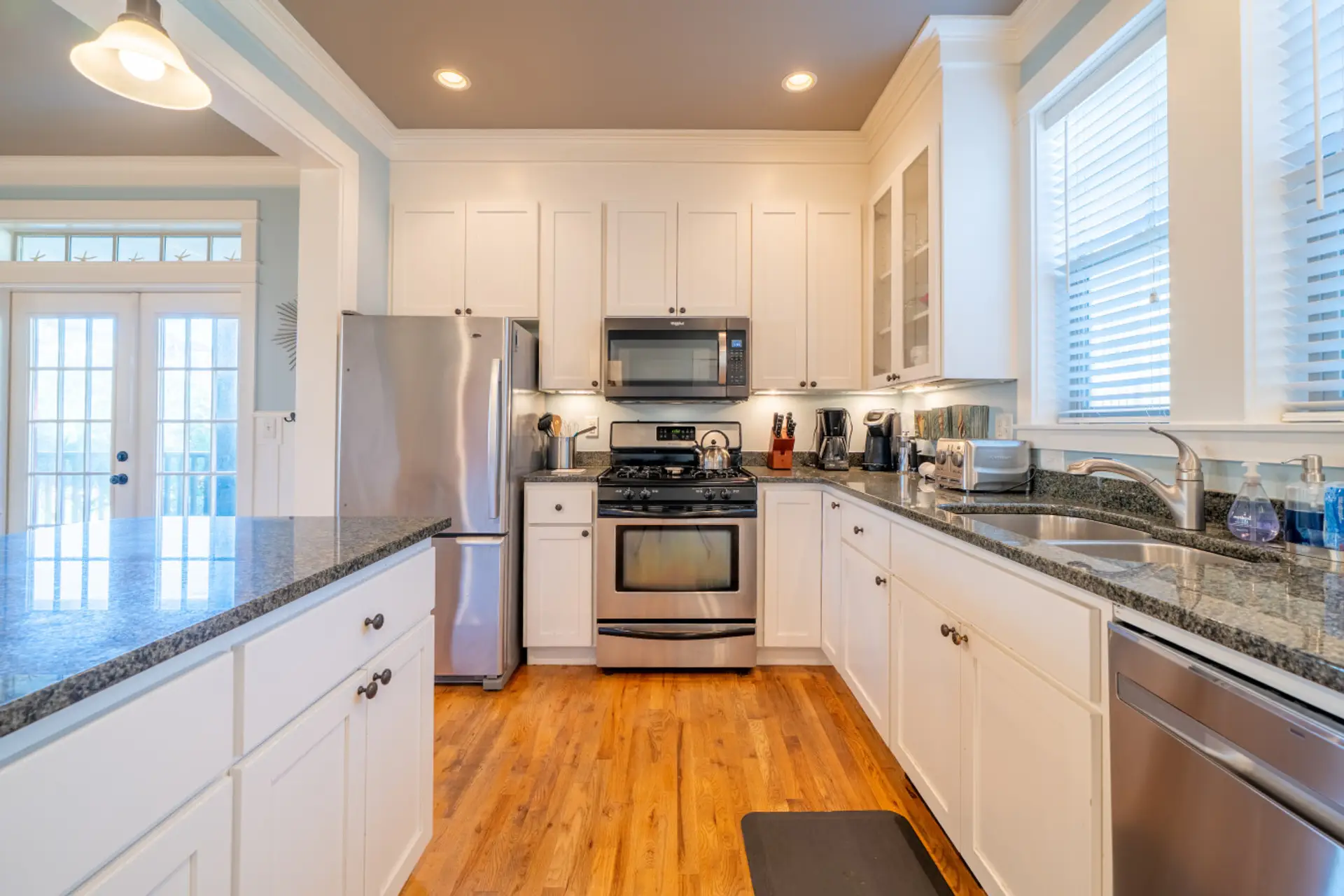 Fully equipped kitchen with large island, perfect for group meals and easy mornings.