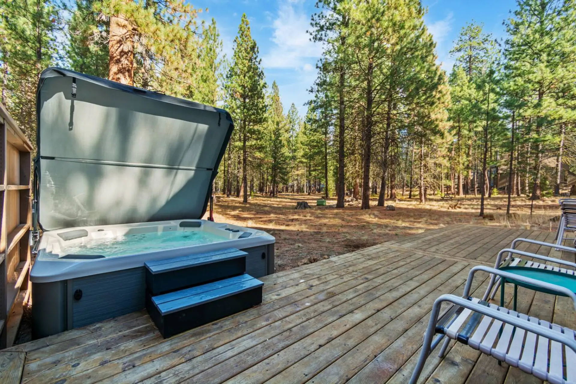 Private hot tub tucked among the pines