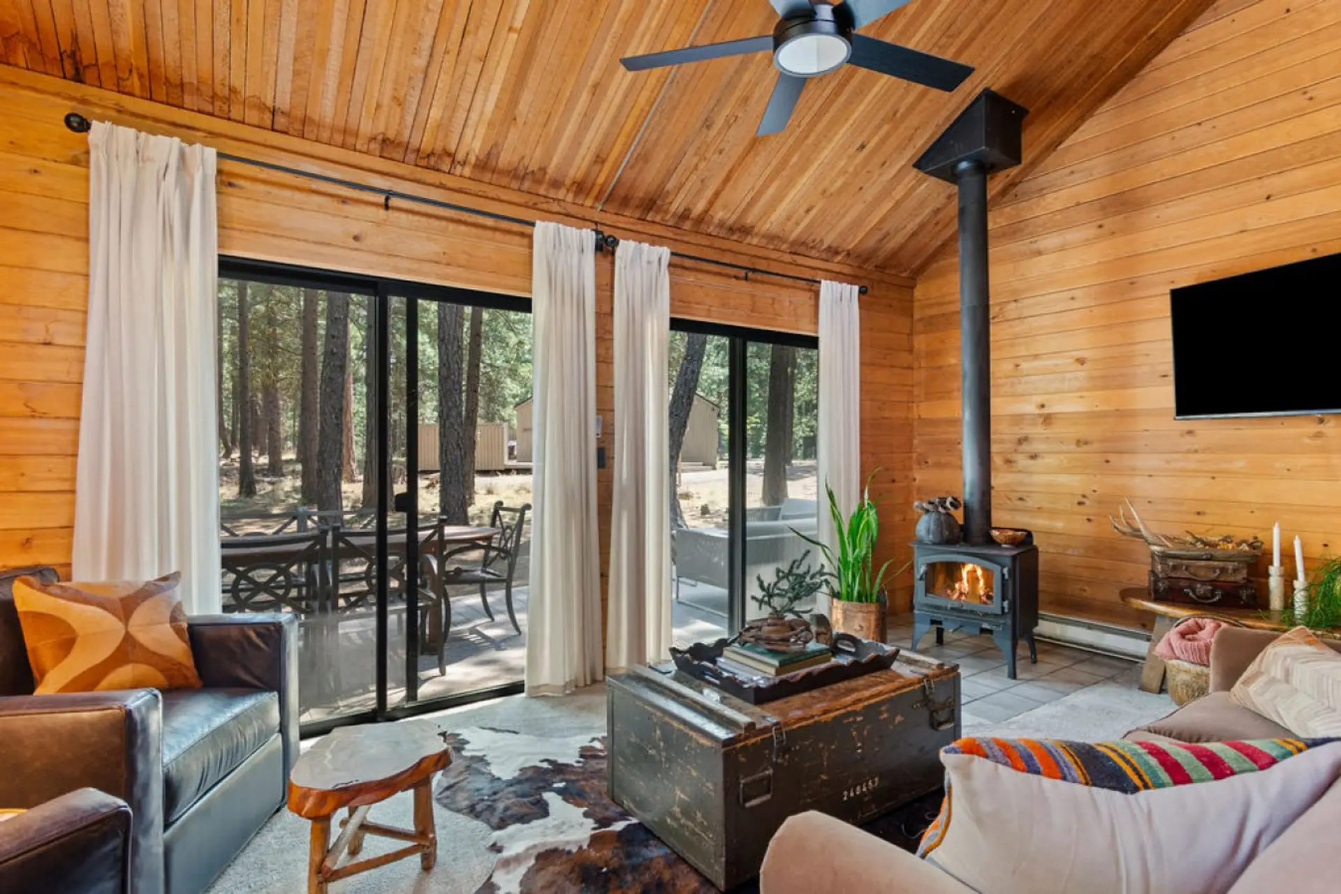 Relax with forest views, comfortable seating, and abundant natural light.