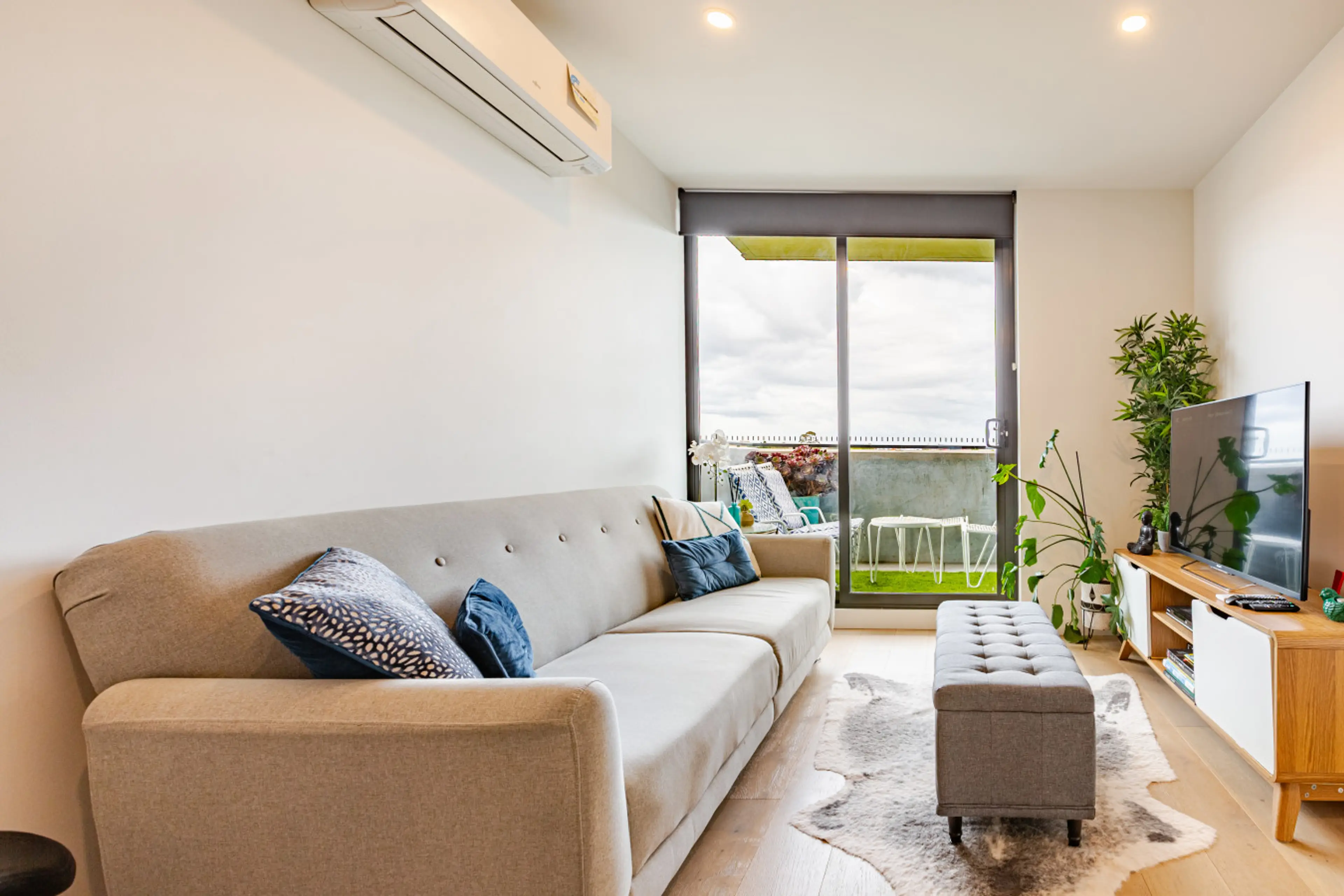 Living Area Lounge Leading to Balcony