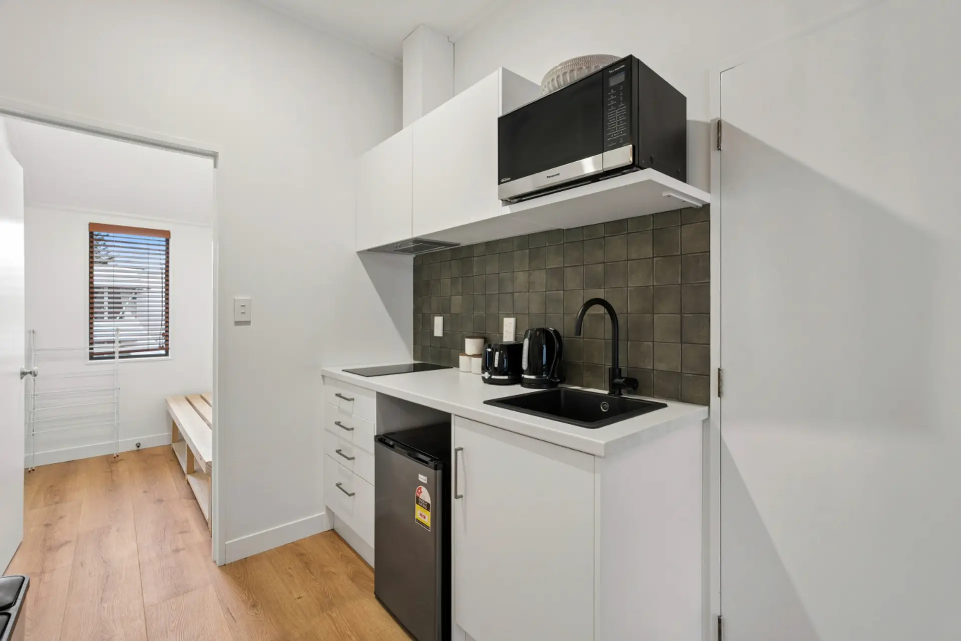 Kitchenette: Enjoy modern amenities and sleek design for your culinary adventures!