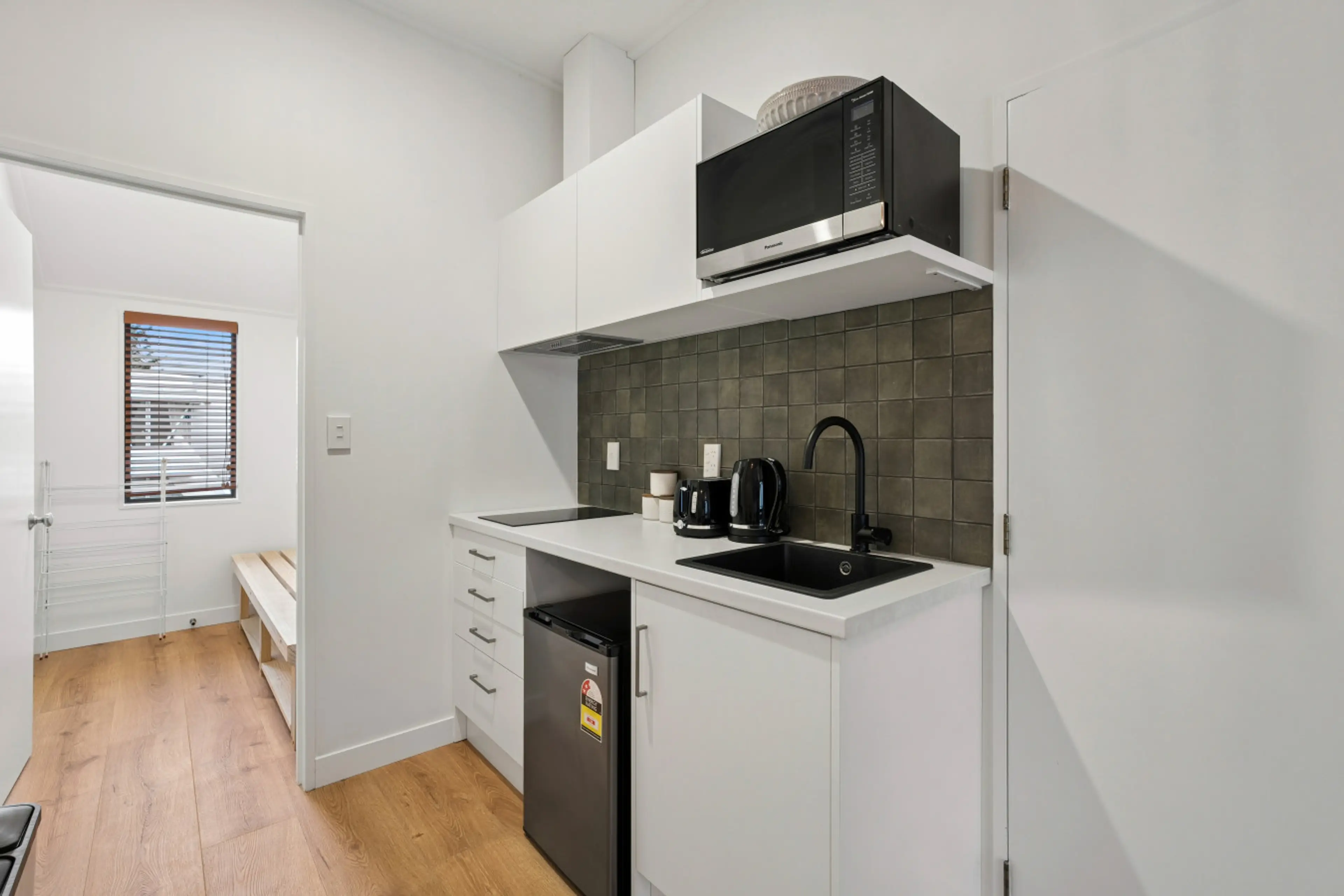 Kitchenette: Enjoy modern amenities and sleek design for your culinary adventures!