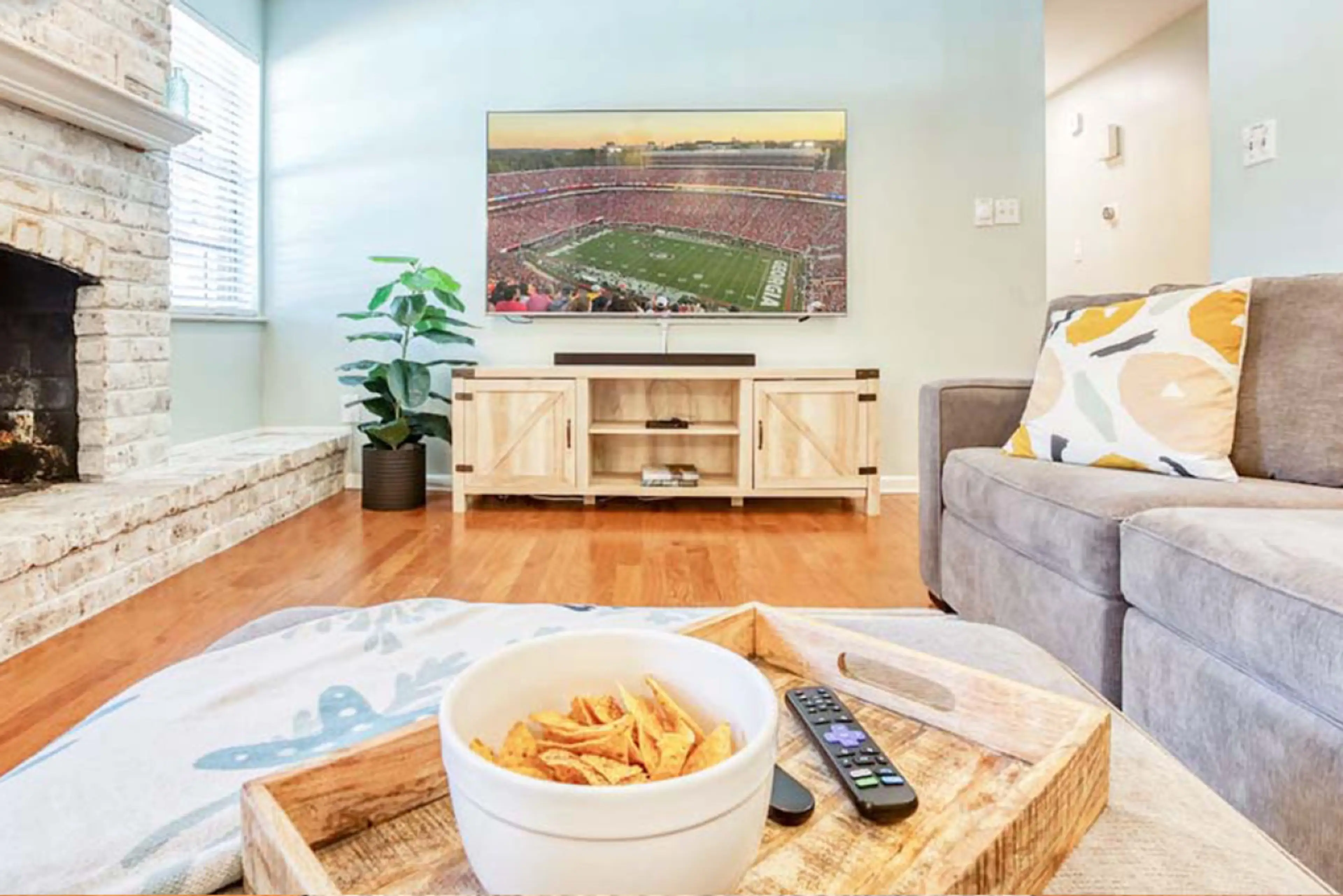 Smart TV & Sound System Catch the big game or stream your favorite shows. The smart TV and sound system make this living room the ideal spot for movie nights or quiet evenings in.