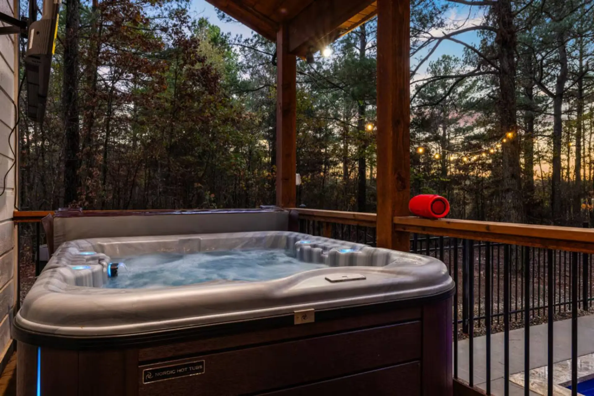 Slide into your private hot tub on the deck, tucked in the pines—steam rising, stars overhead, and that deep exhale you’ve been chasing. Stay in a little longer.