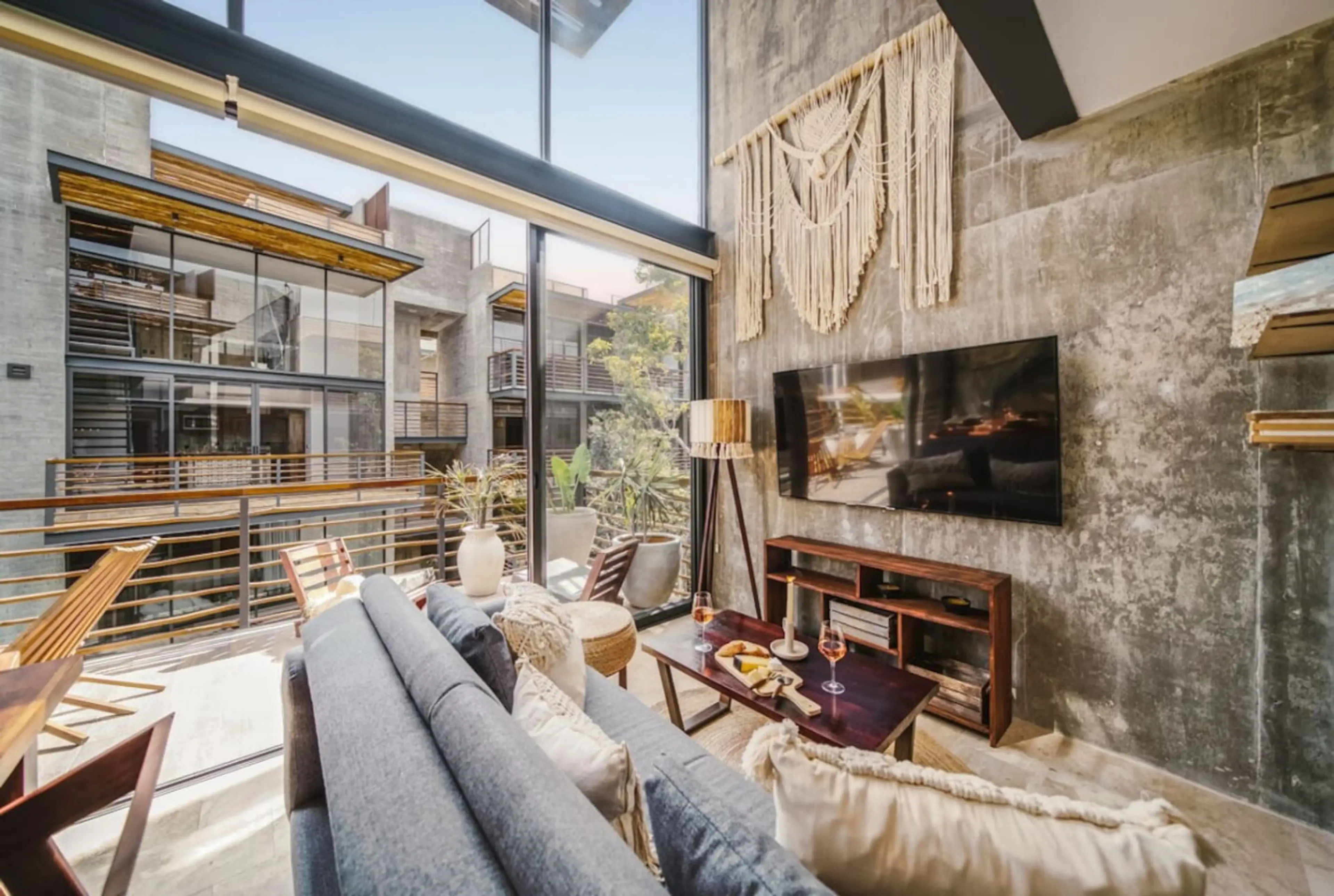 Unwind in a spotless, sunlit space with a comfy sofa + TV — perfect for relaxation and cozy moments!