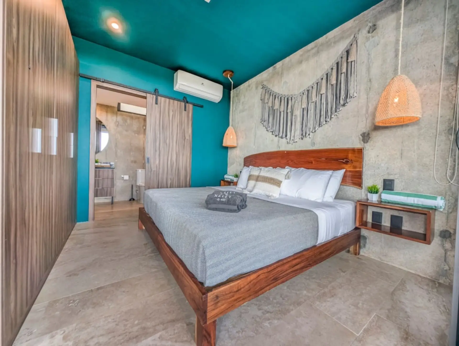 Enjoy a serene and comfortable stay in this thoughtfully designed bedroom, offering plush bedding, elegant décor, and a relaxing ambiance inspired by Tulum's natural beauty and laid-back charm.