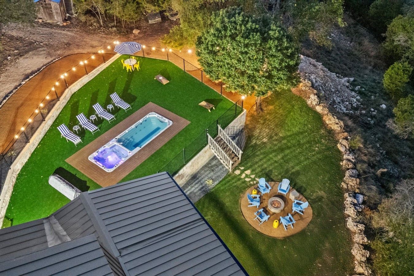 Elite STR Hosting Co Hill Country property exterior with stone facade