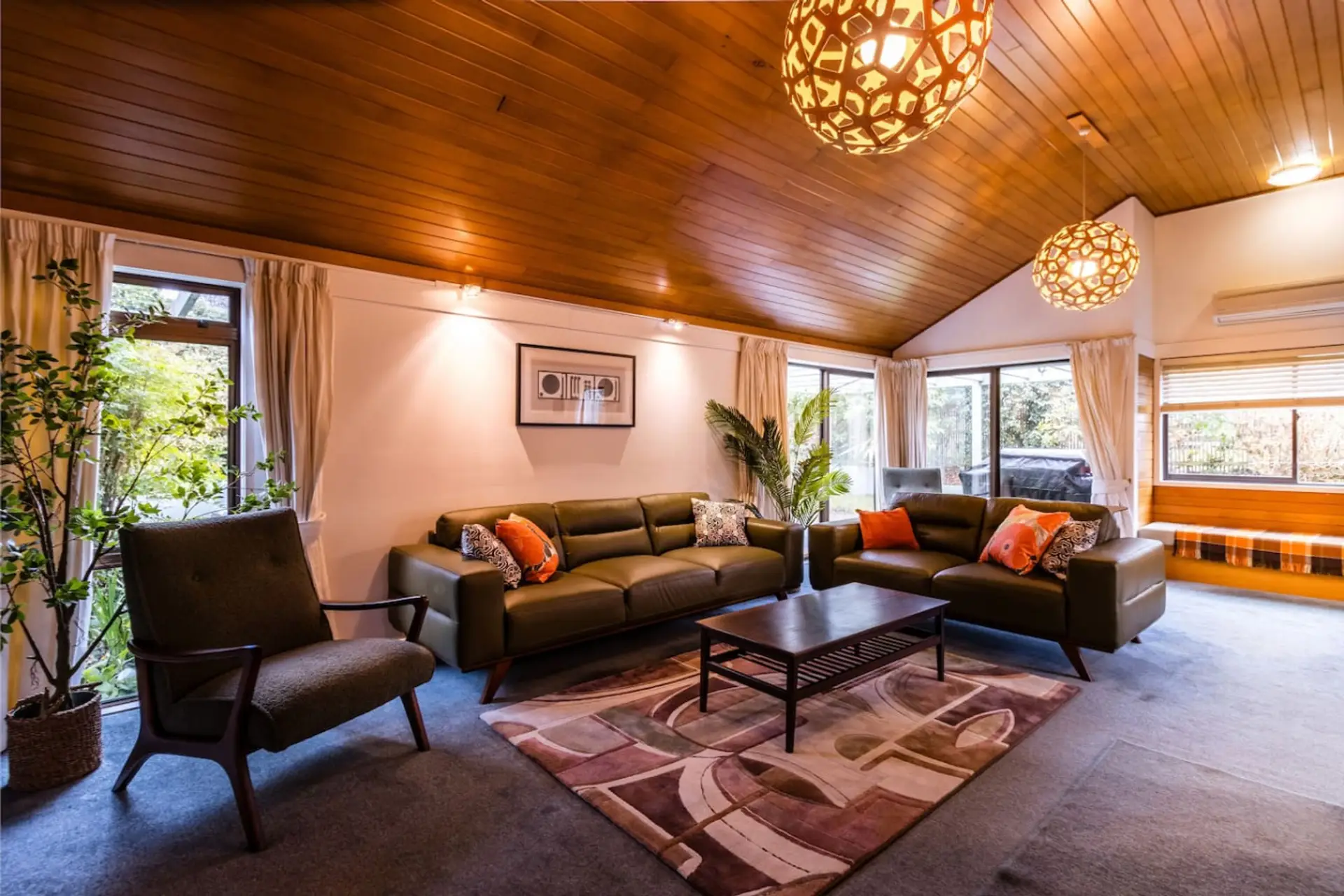 Stretch out and unwind in the lounge with room for the whole crew — two sofas, comfy chairs, a roaring fire, and a 65" smart TV. Whether it’s movie night or wine and chats, this is your cosy holiday hangout.