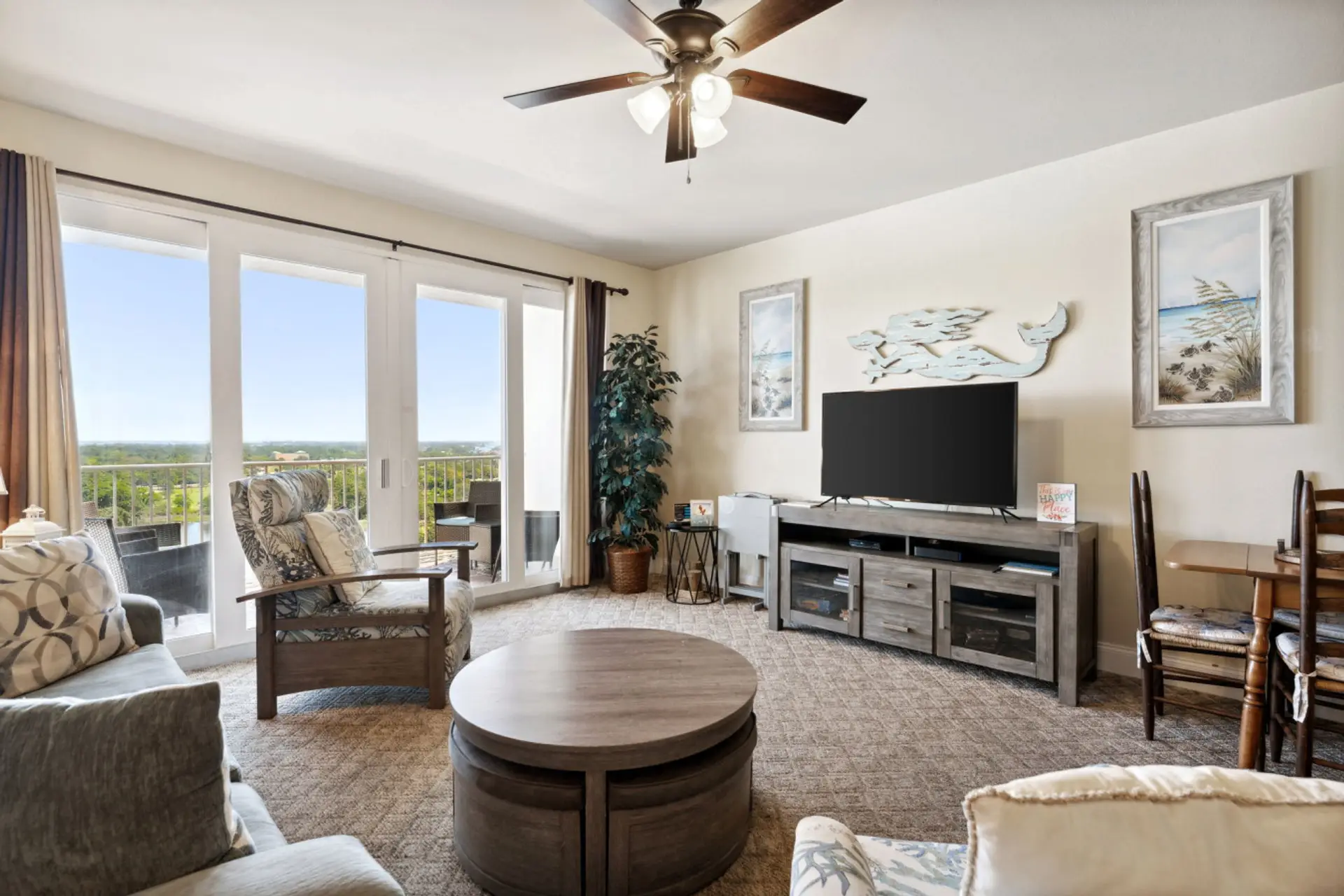 Cozy Lake View Living Room with Sleeper Sofa, Flat Screen TV and Private Balcony Access